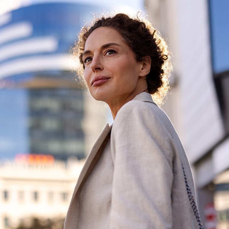 woman looking over her shoulder