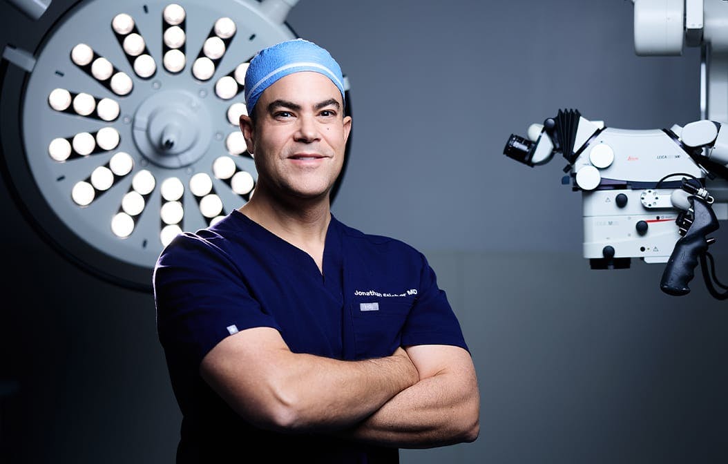doctor standing with his arms crossed