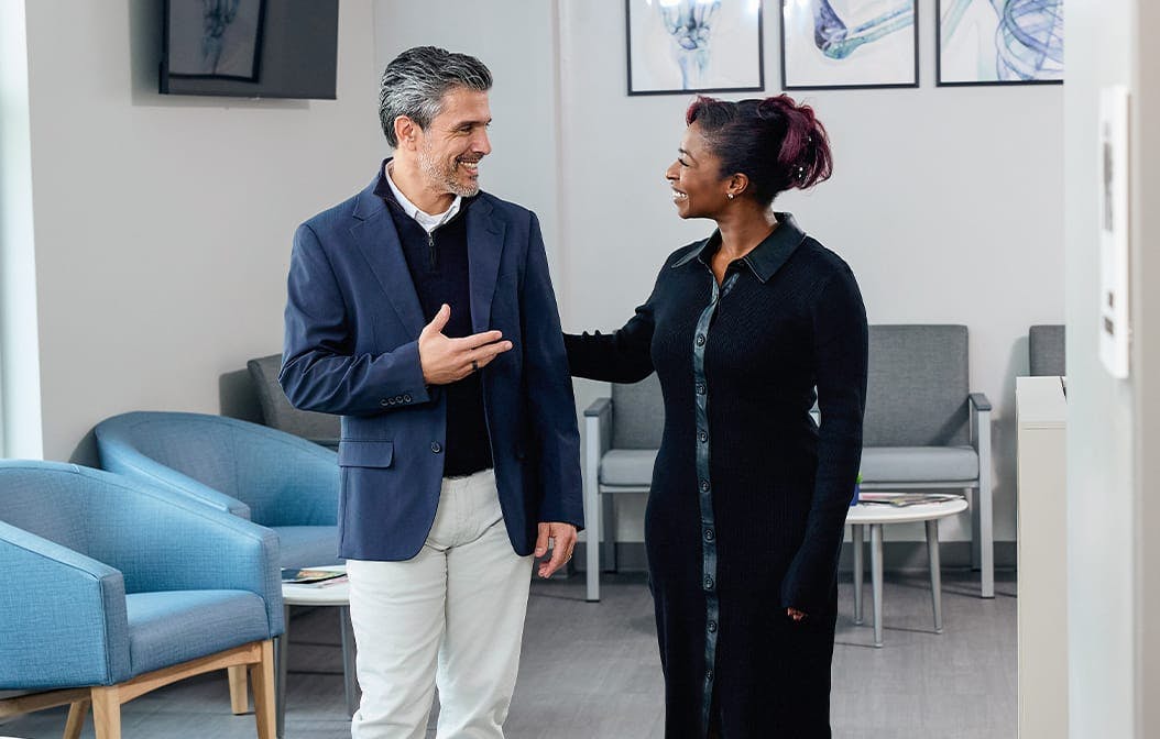 man and woman talking to each other