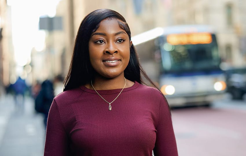 woman standing by a street