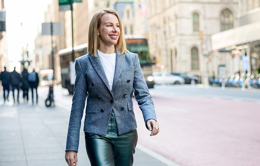woman walking by a street
