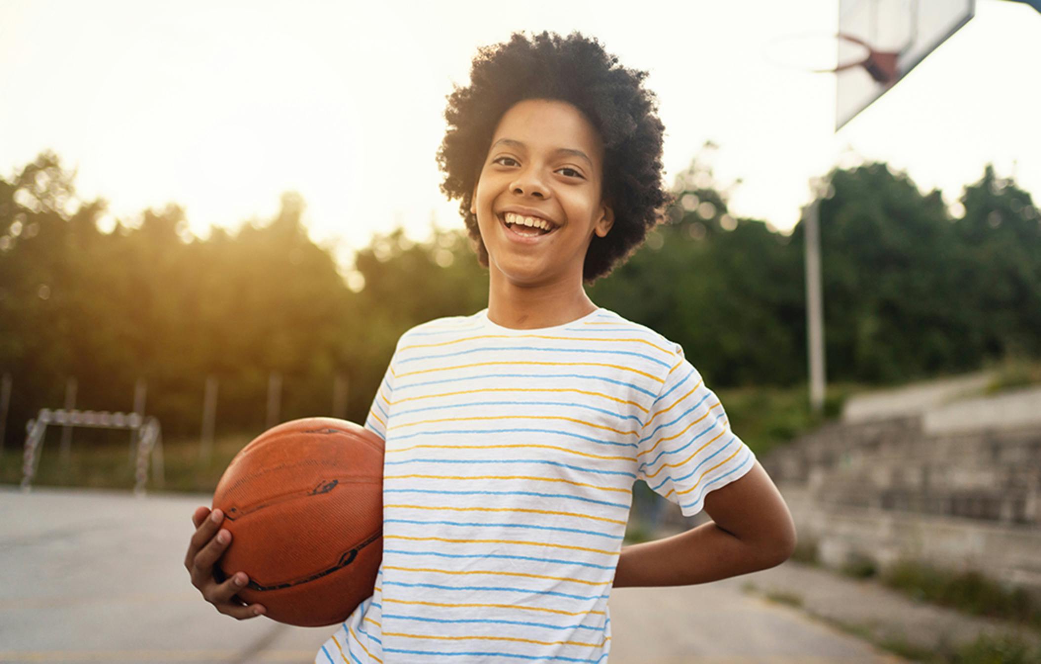 young kid with a basketball