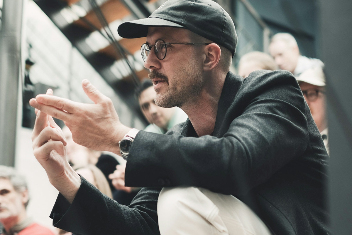 man sitting in an audience