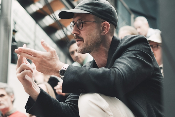 man sitting in an audience