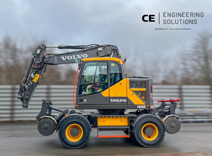 A wheeled excavator with rail road wheels