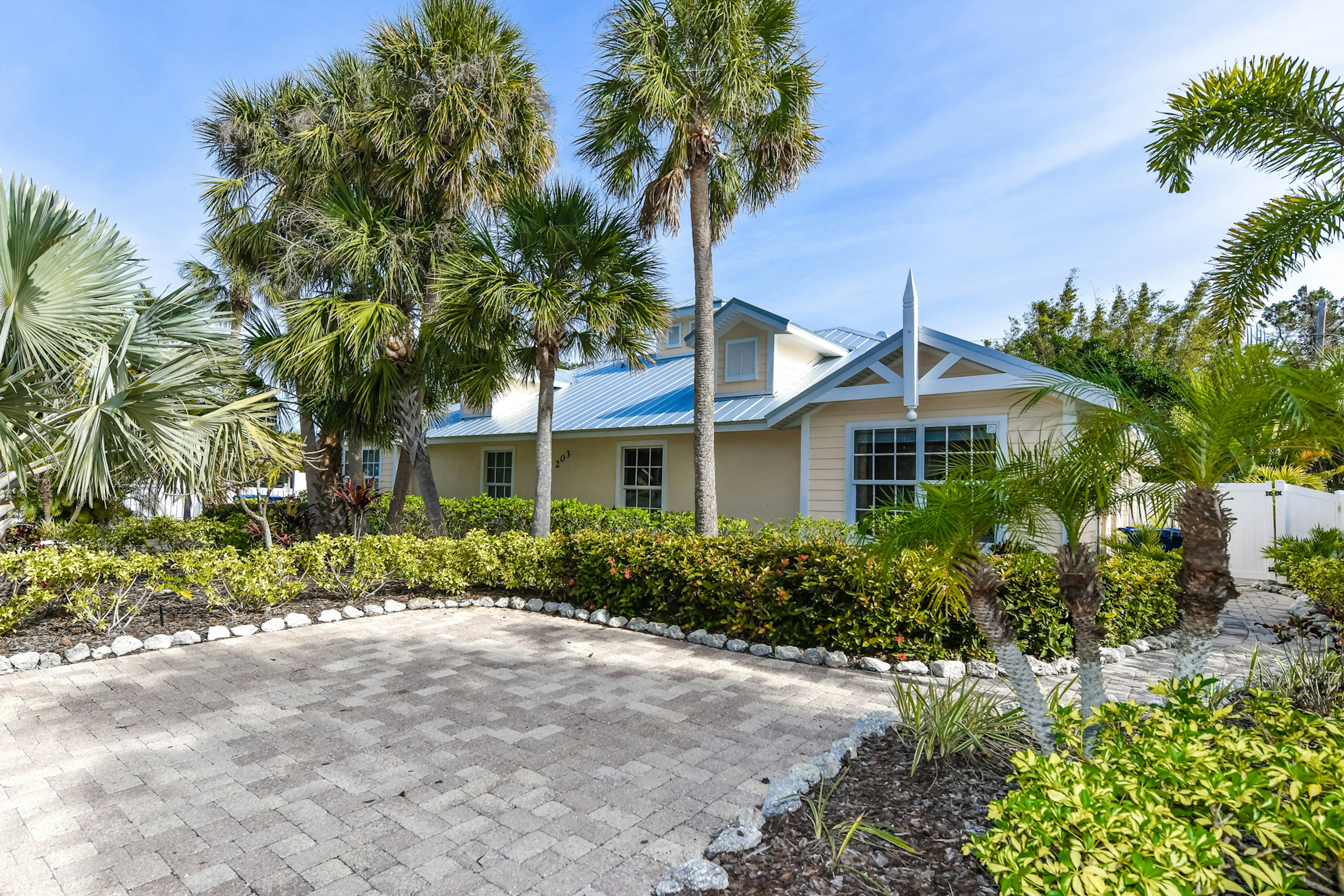 Exterior of Ariel's Island West Unit by AMI Locals
