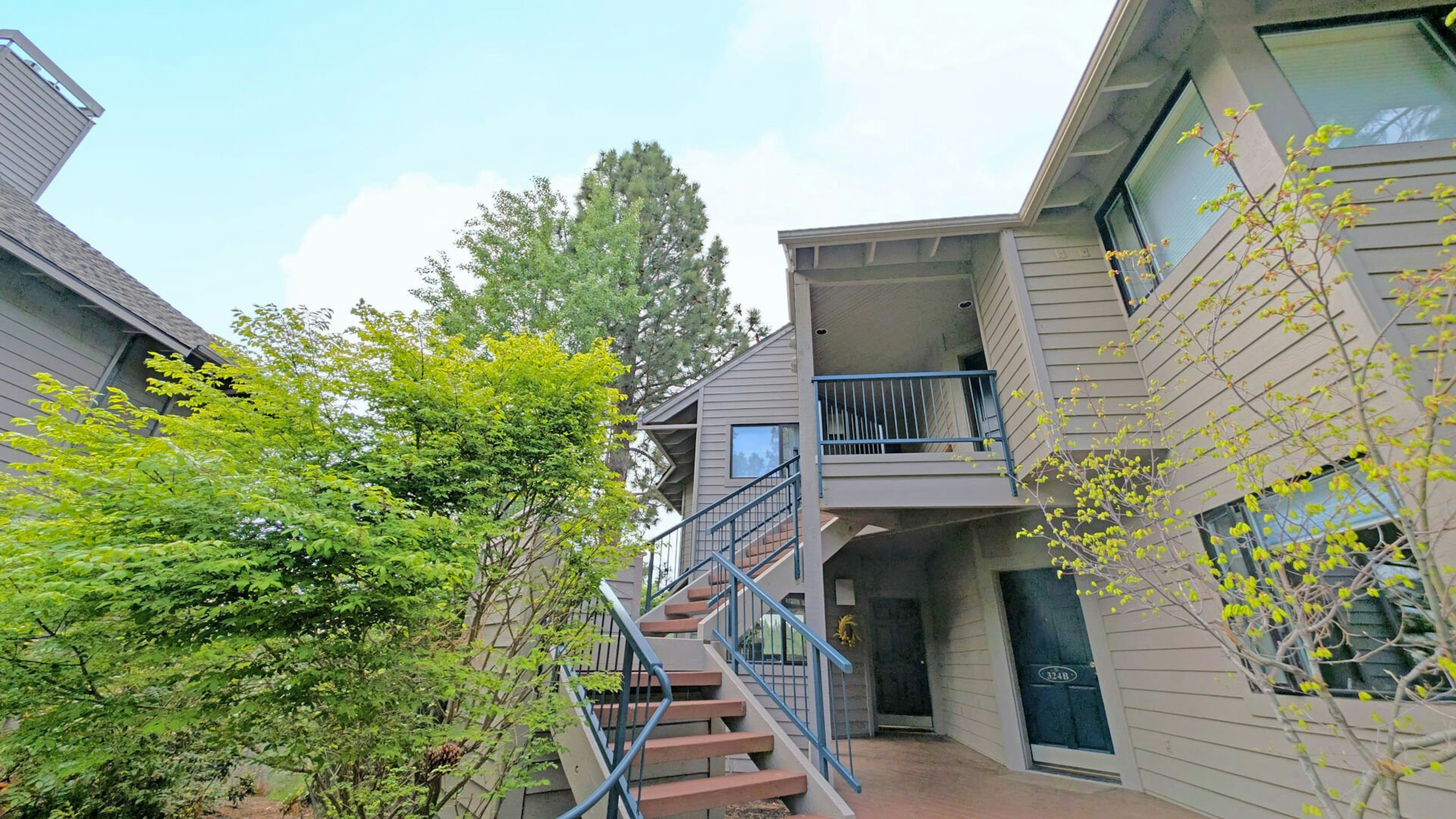 Stairs lead to the 2nd floor Condo