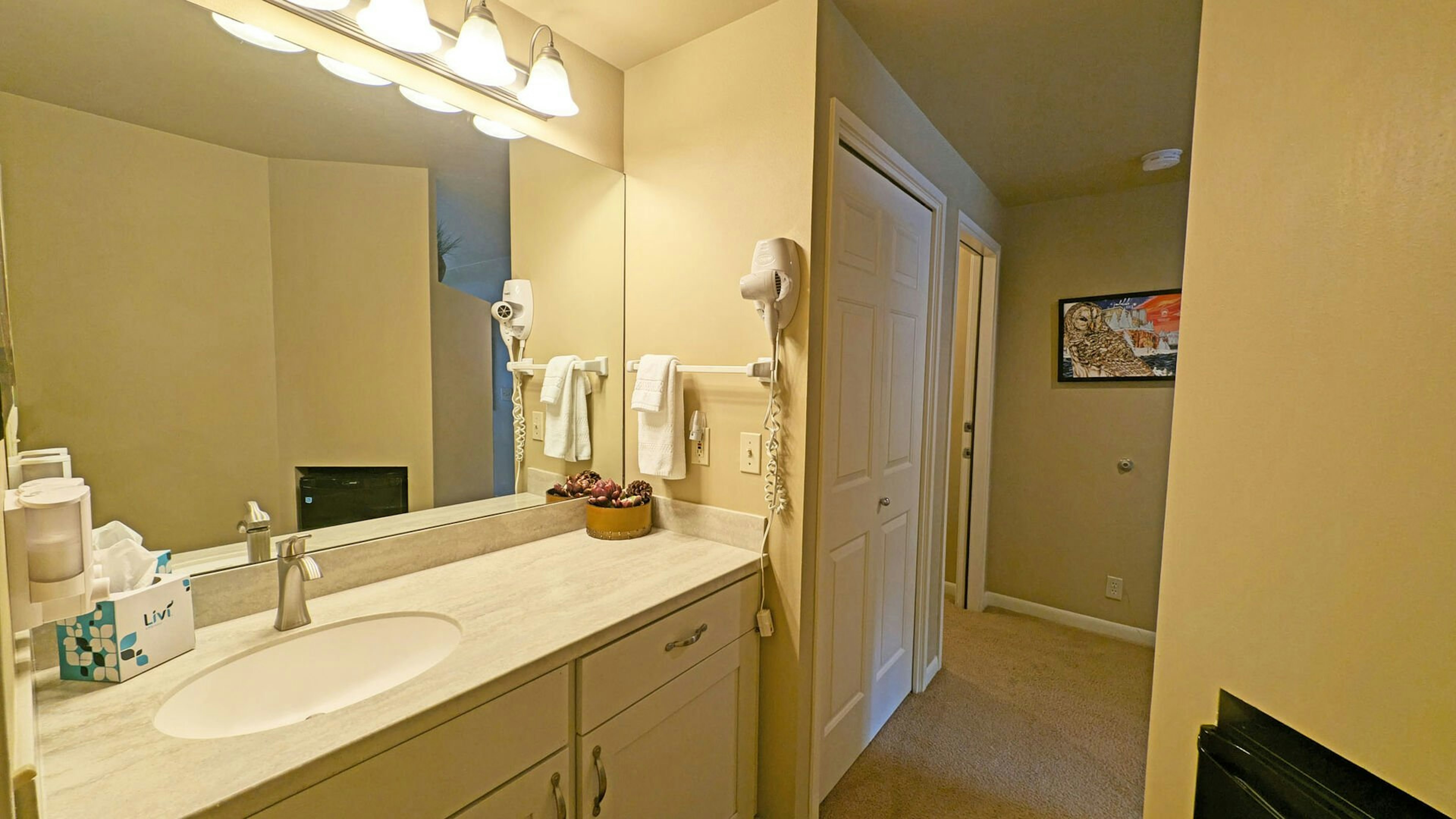A Full bath with single sink vanity