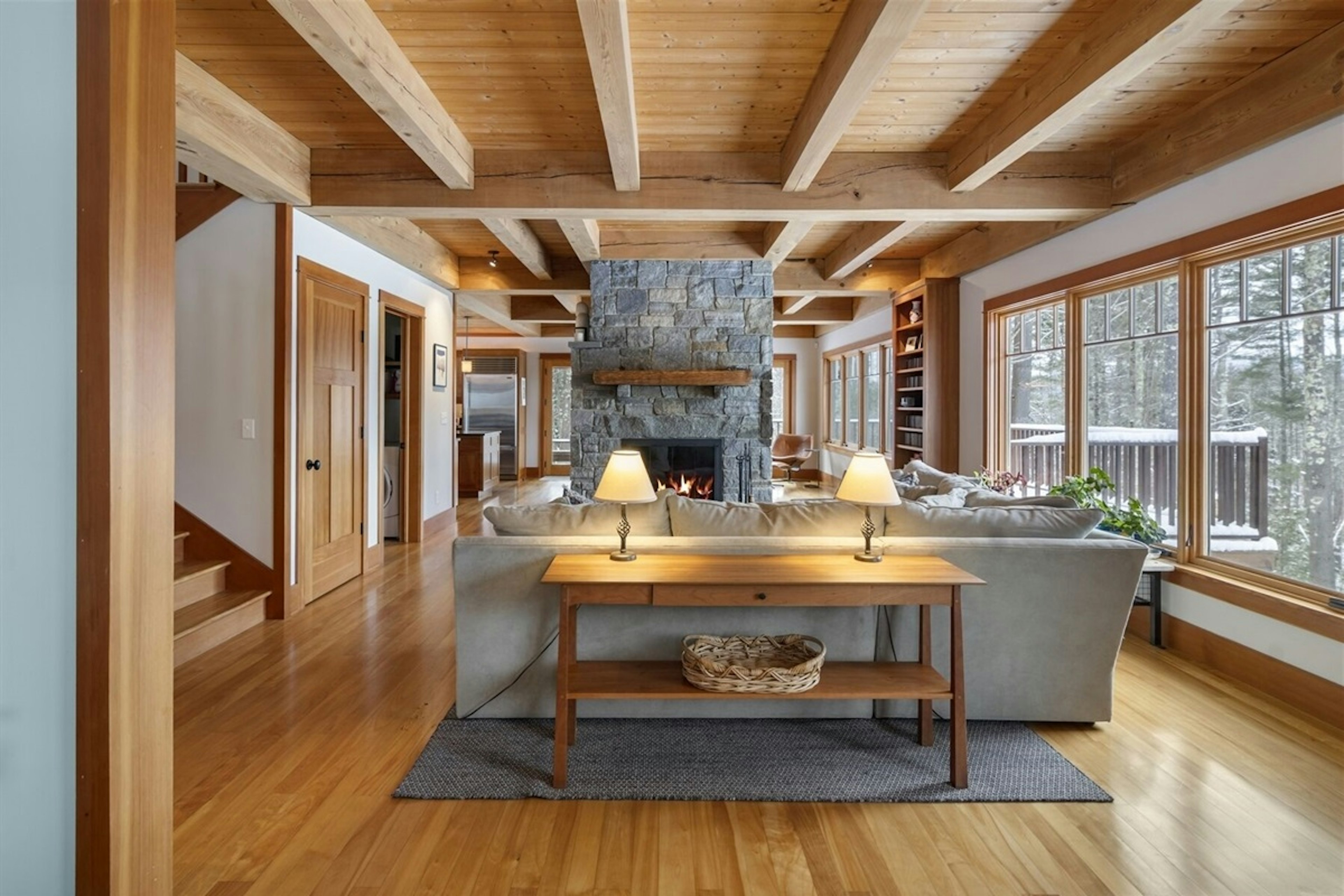 Beautiful Stone Fireplace is the Focal Point of the Room