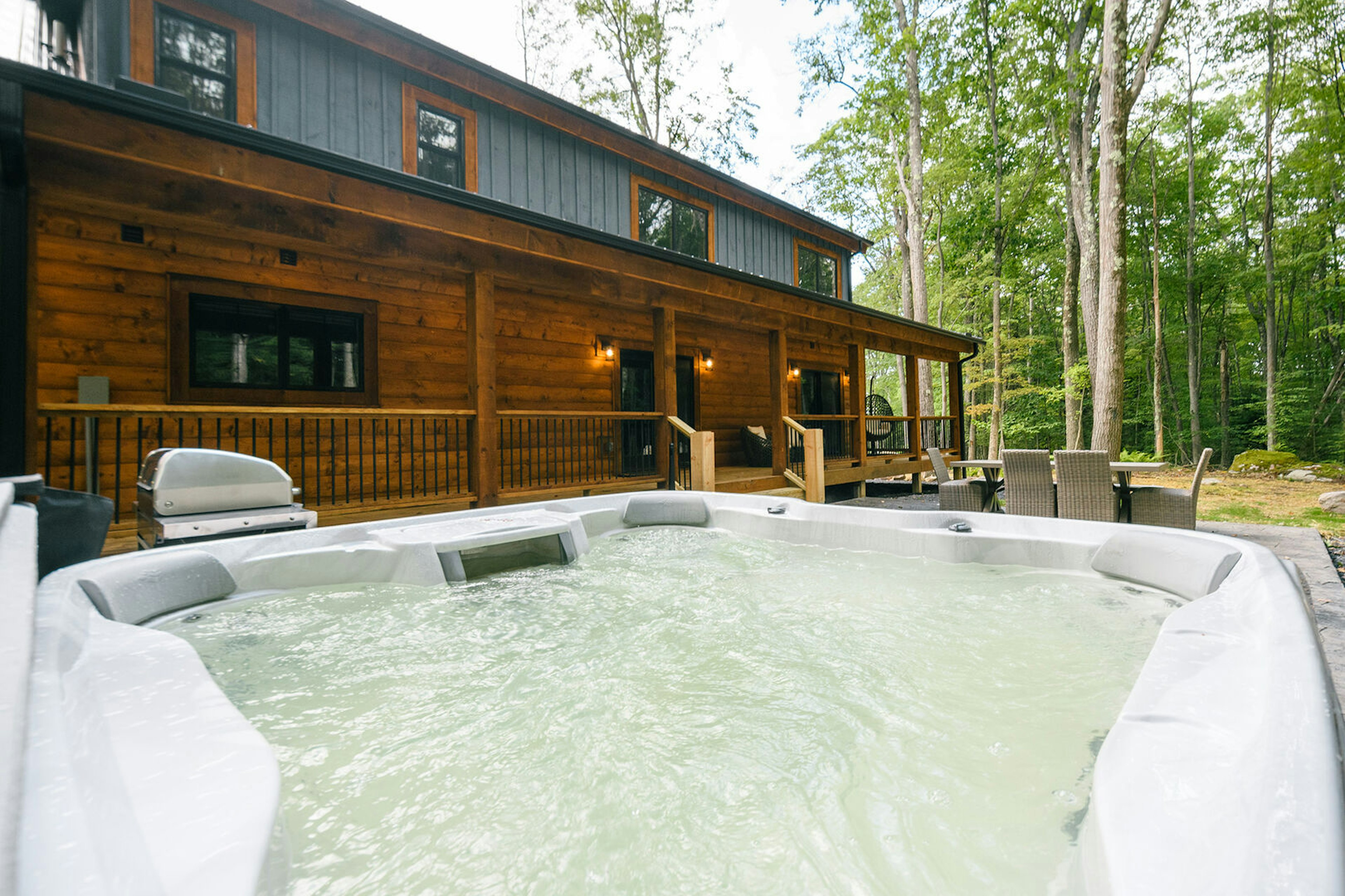 You will love having your own private hot tub along with the outdoor dining area and fire pit.