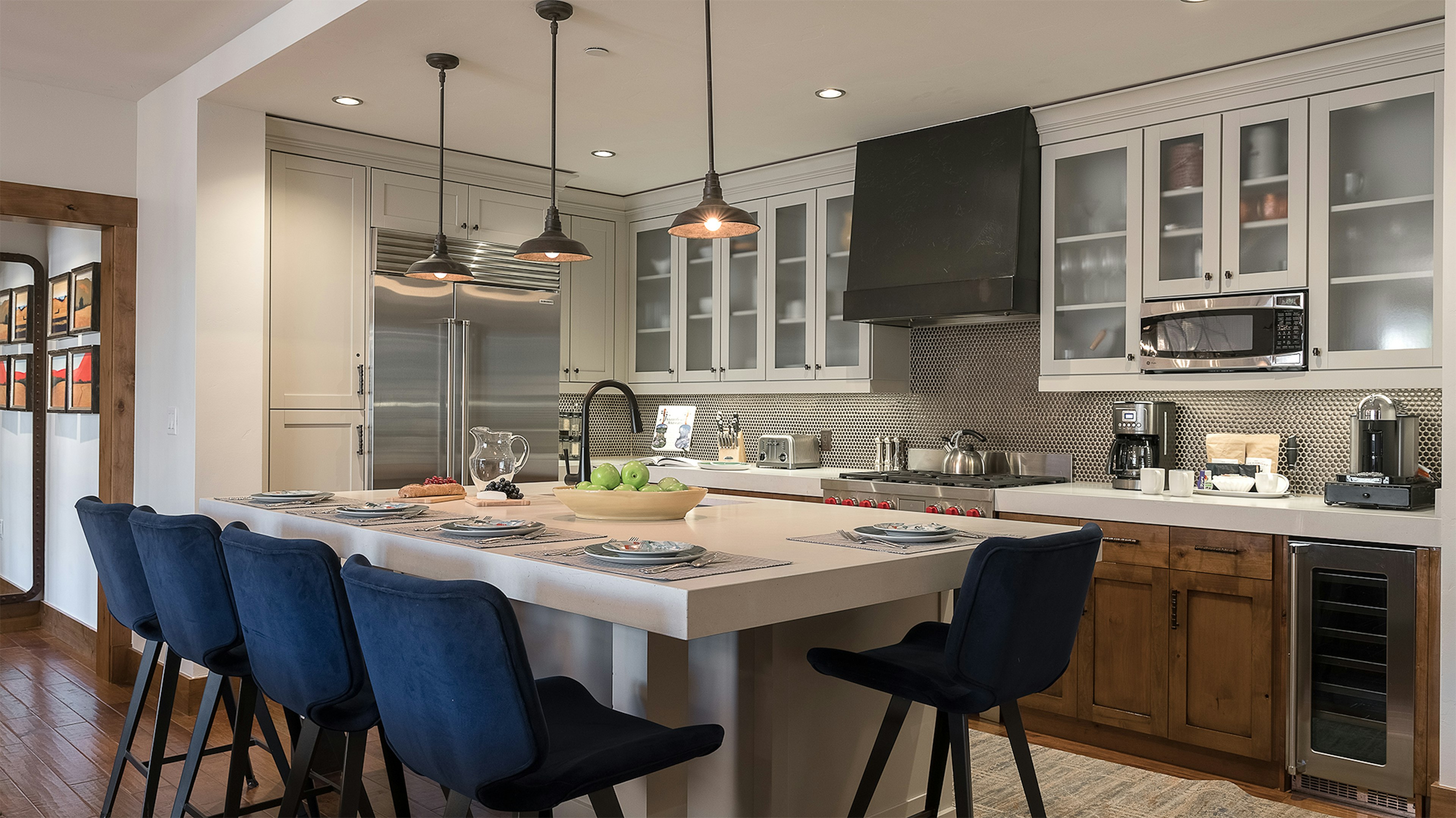 Kitchen, Main Level - Beautifully renovated kitchen with stylish bar seating