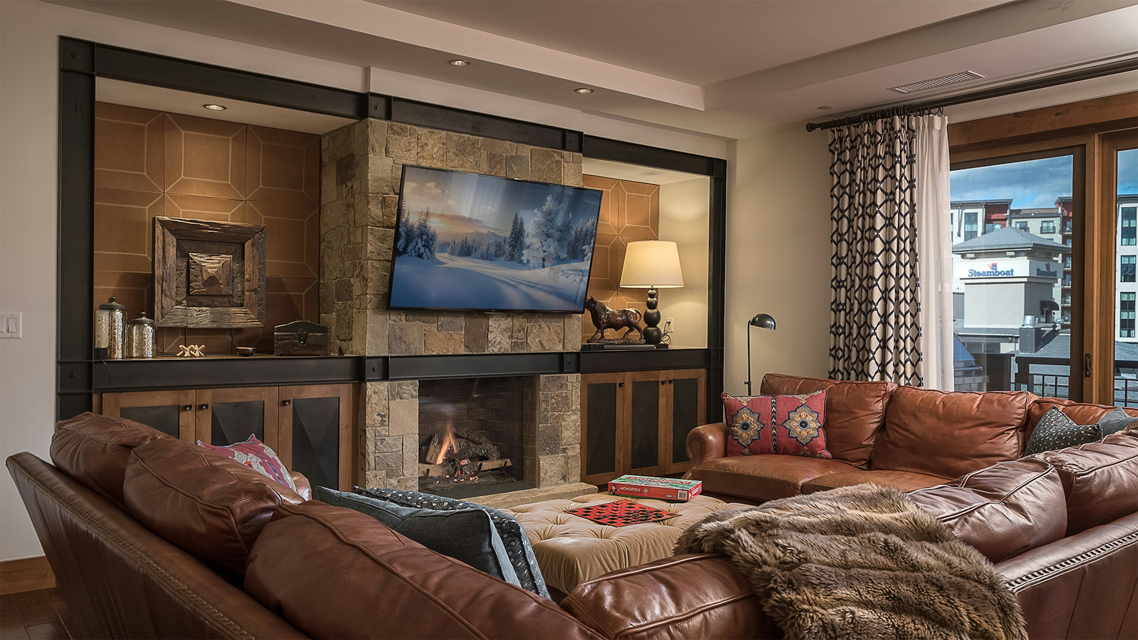 Great Room, Main Level - Relax by the fire or watch your favorite family movie