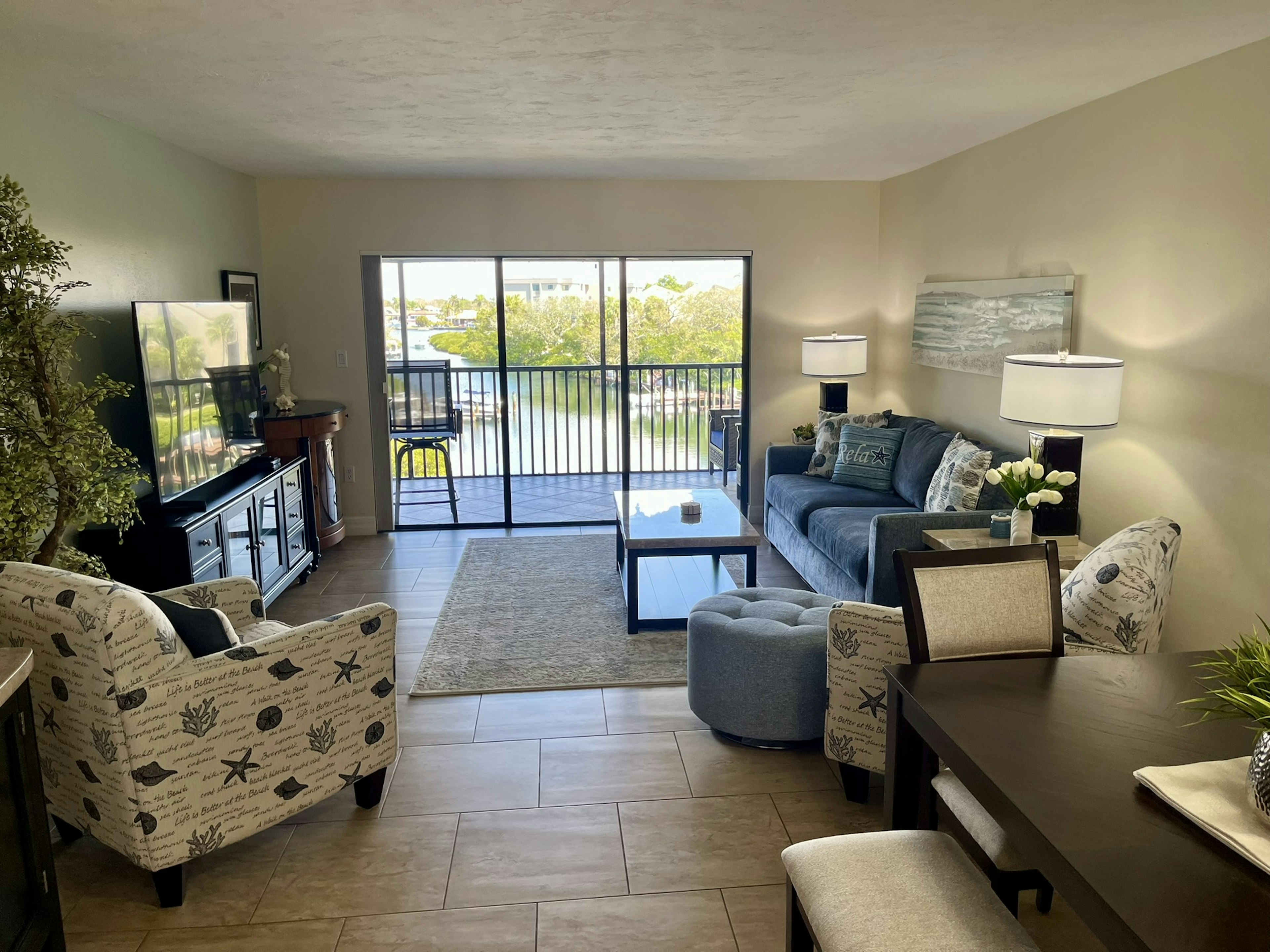 Relax in your stylish living space with comfortable seating and private balcony where you can unwind while taking in peaceful views.