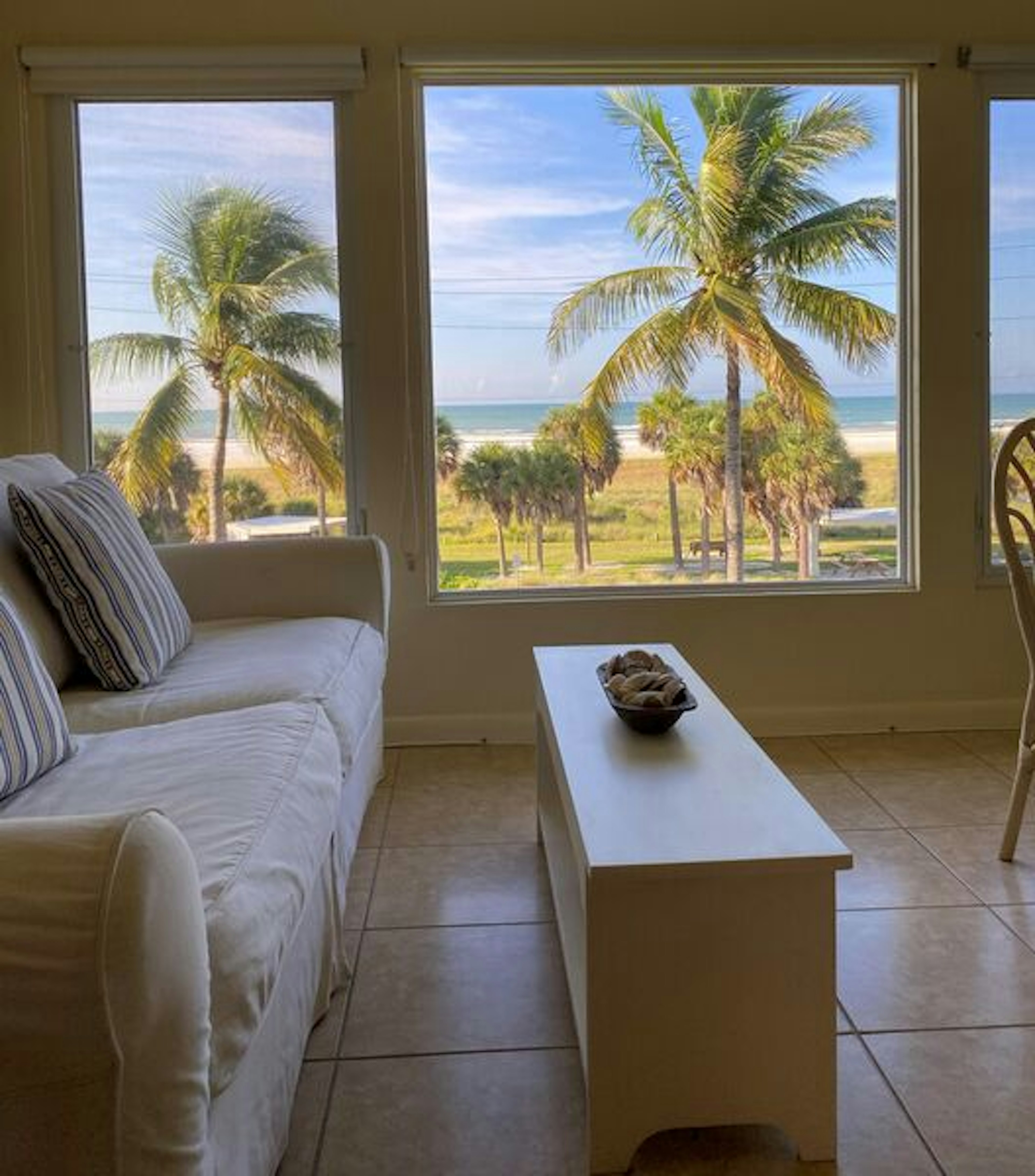 Screened lanai with comfortable seating