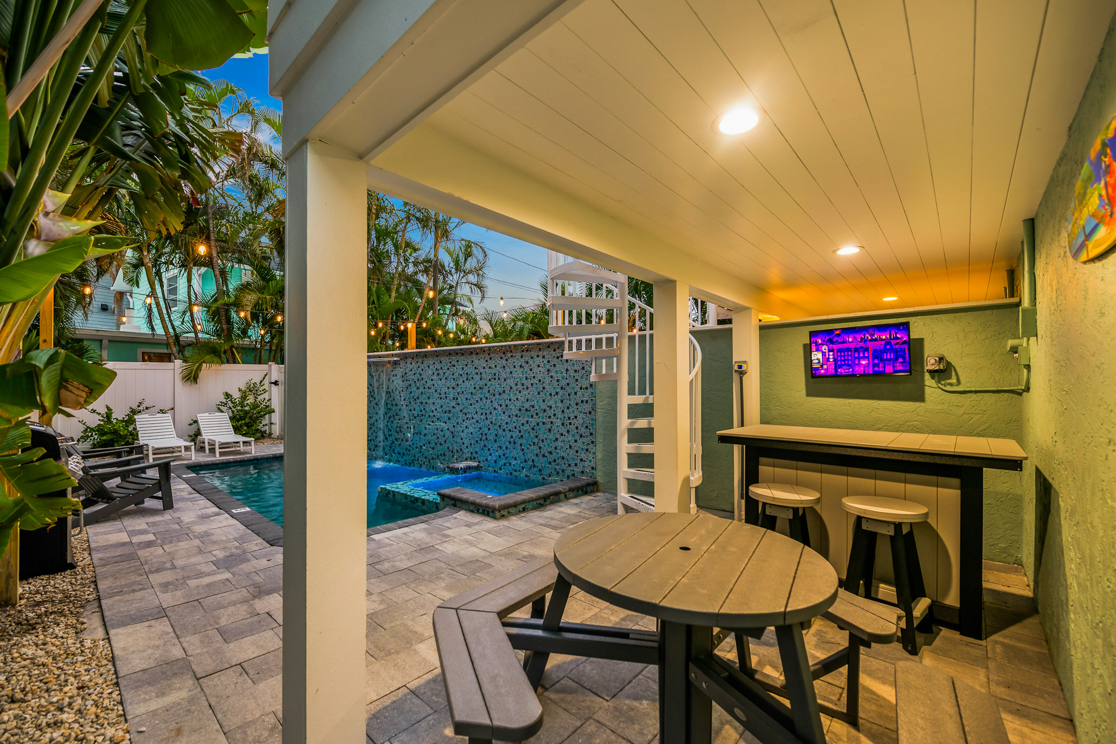 Outdoor Pool, Spa, and Seating - Village Time