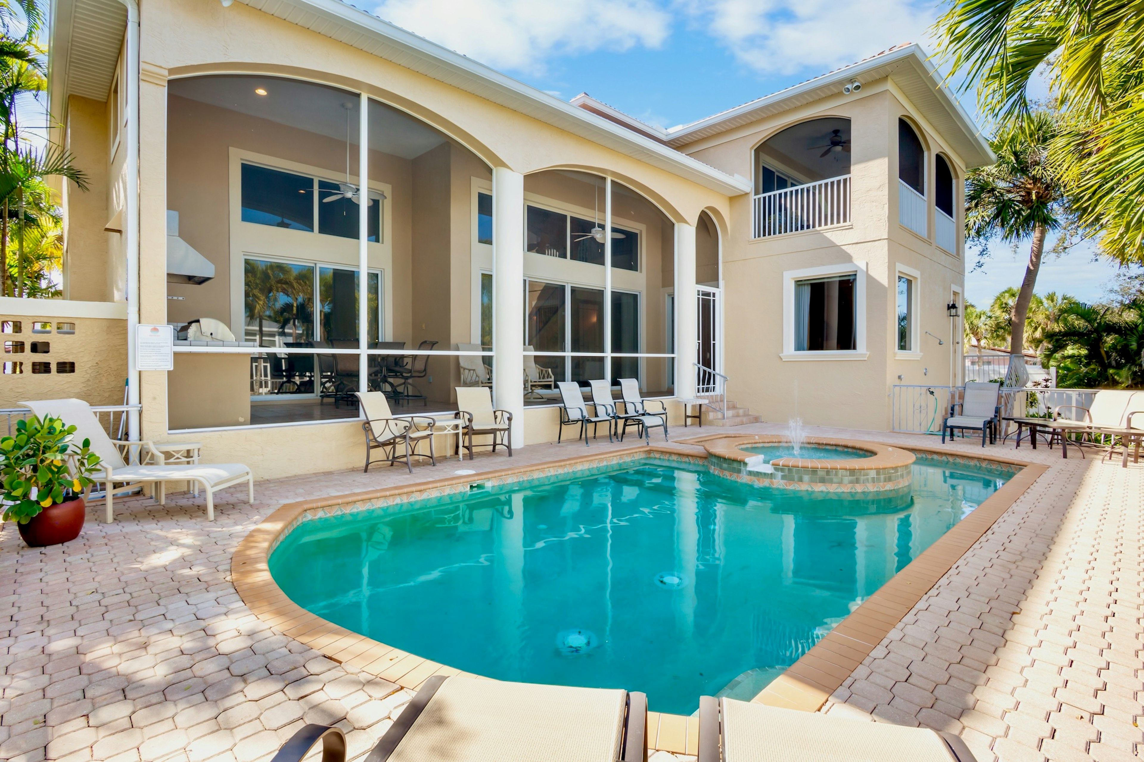 Private heated pool with spacious covered patio