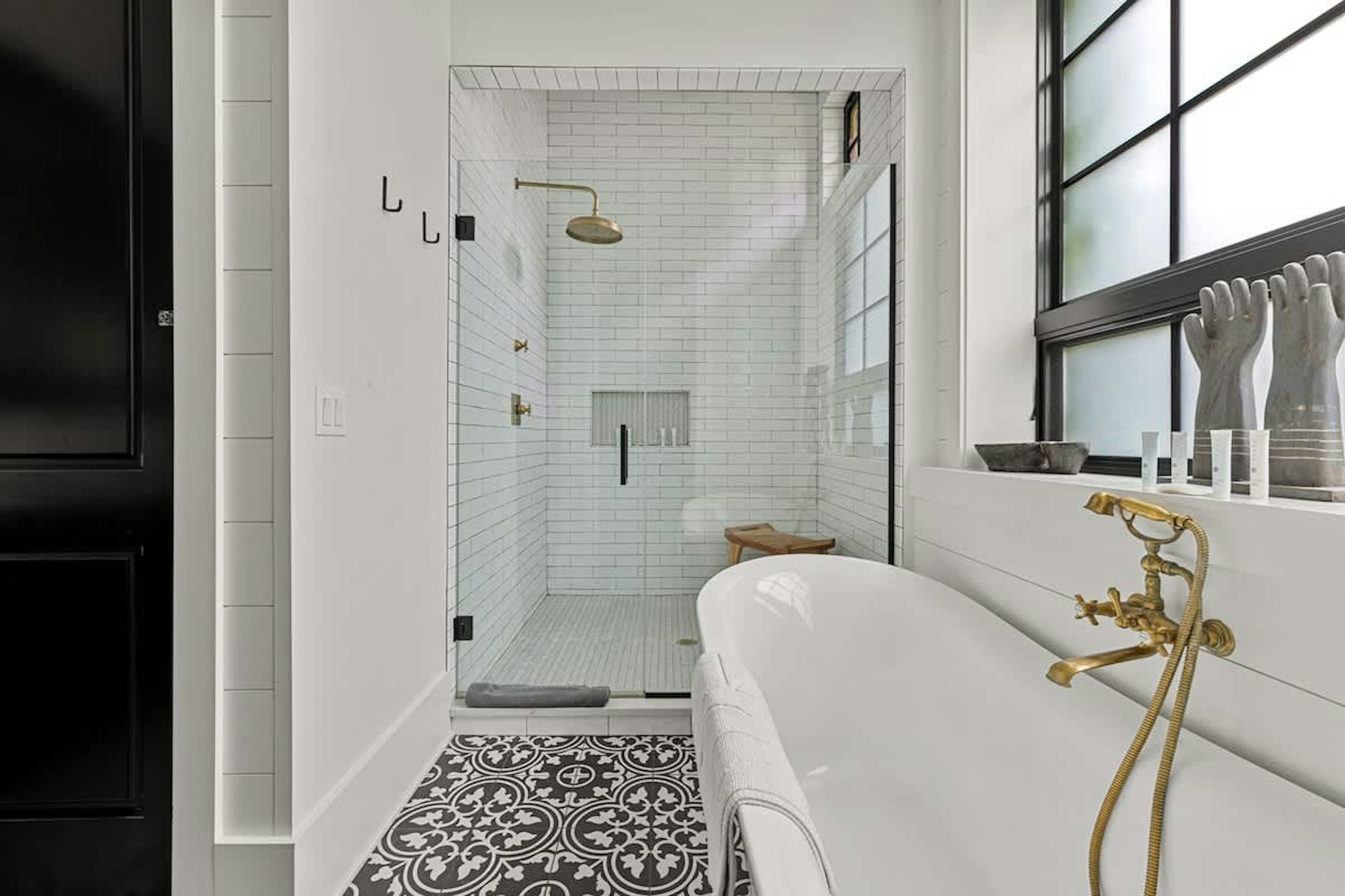 The oversized walk-in shower provides a luxury spa experience every day of your stay here.