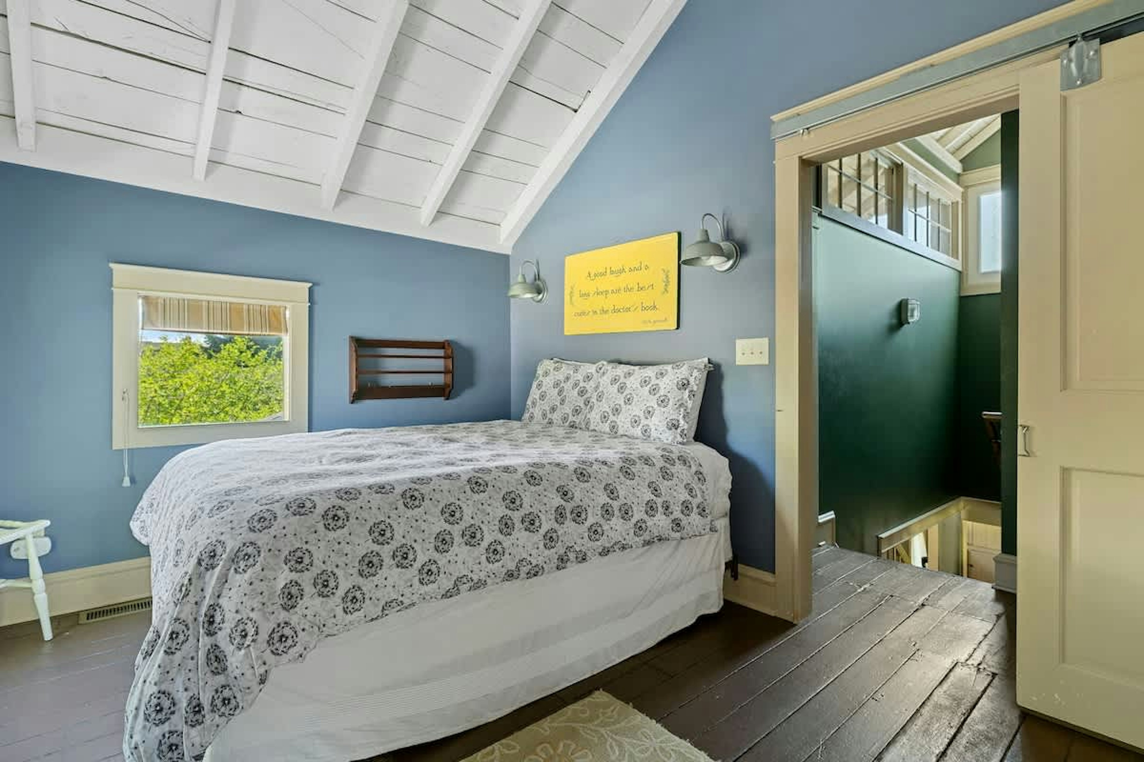 Bedroom 2 is on the upper level & has a queen-size bed.