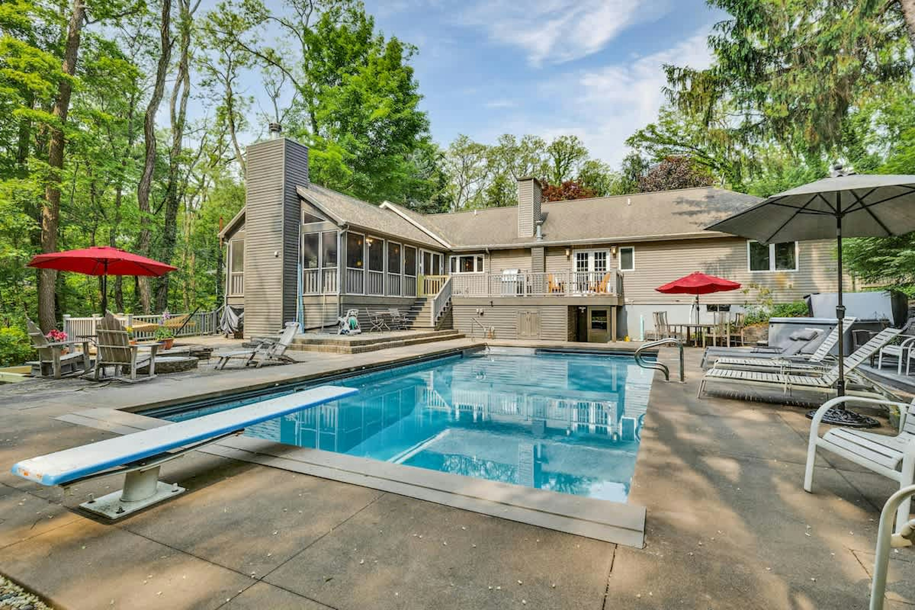 Cannonballs, cocktails, and poolside lounging await.