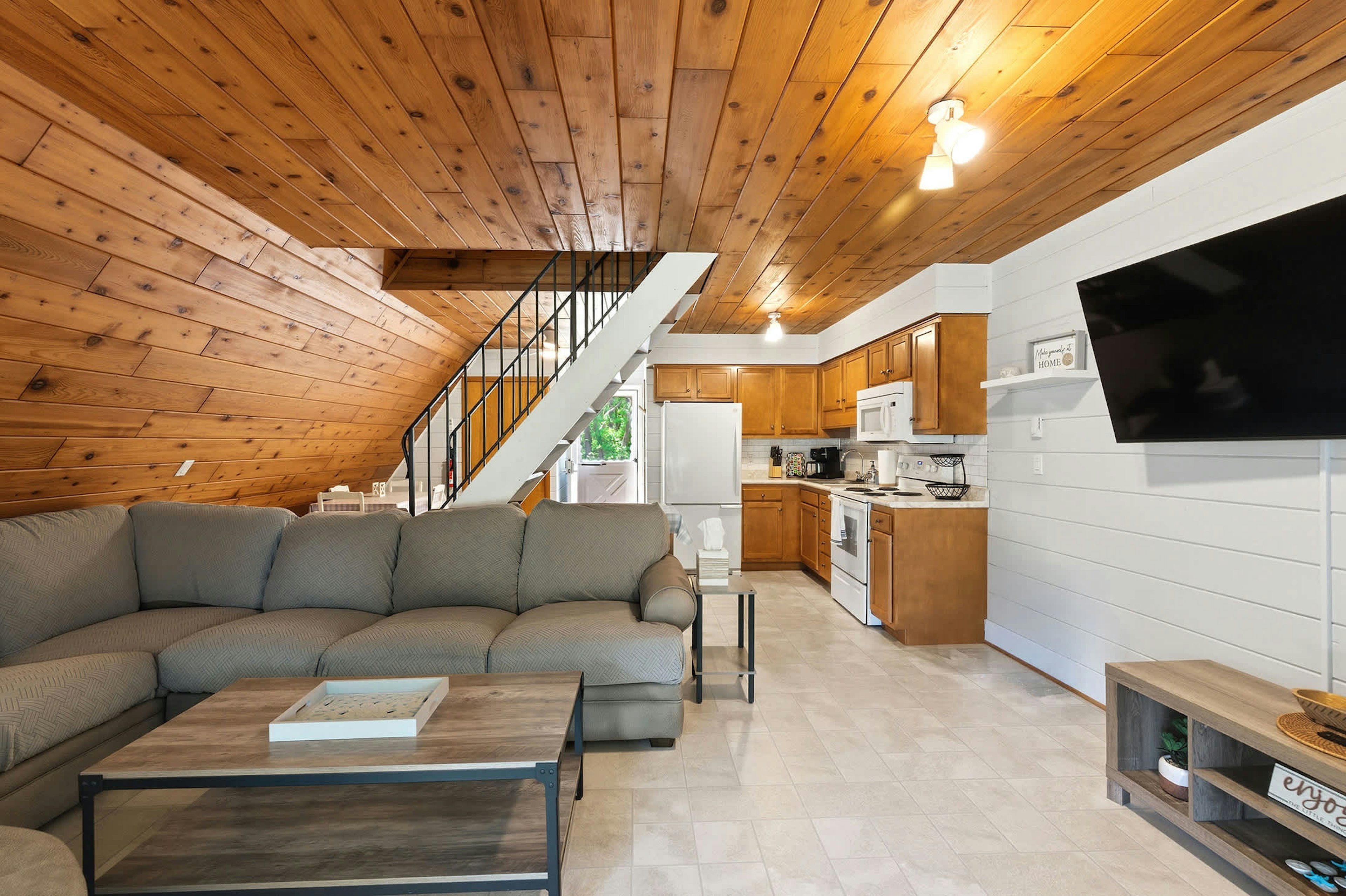 Open living and kitchen area, everything on one floor with easy flow between spaces.