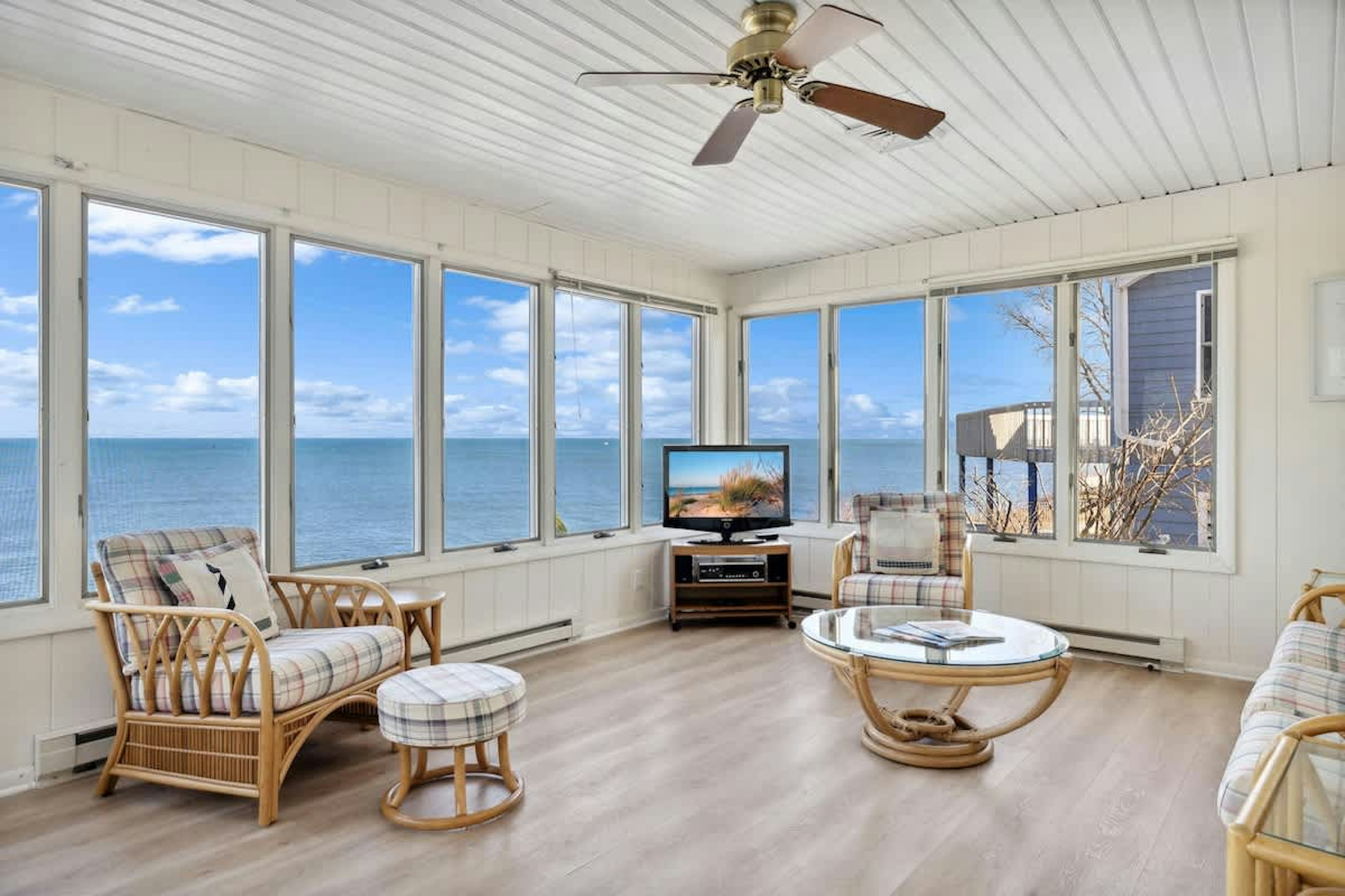 This cozy space offers the perfect spot to unwind and catch up on your favorite shows.