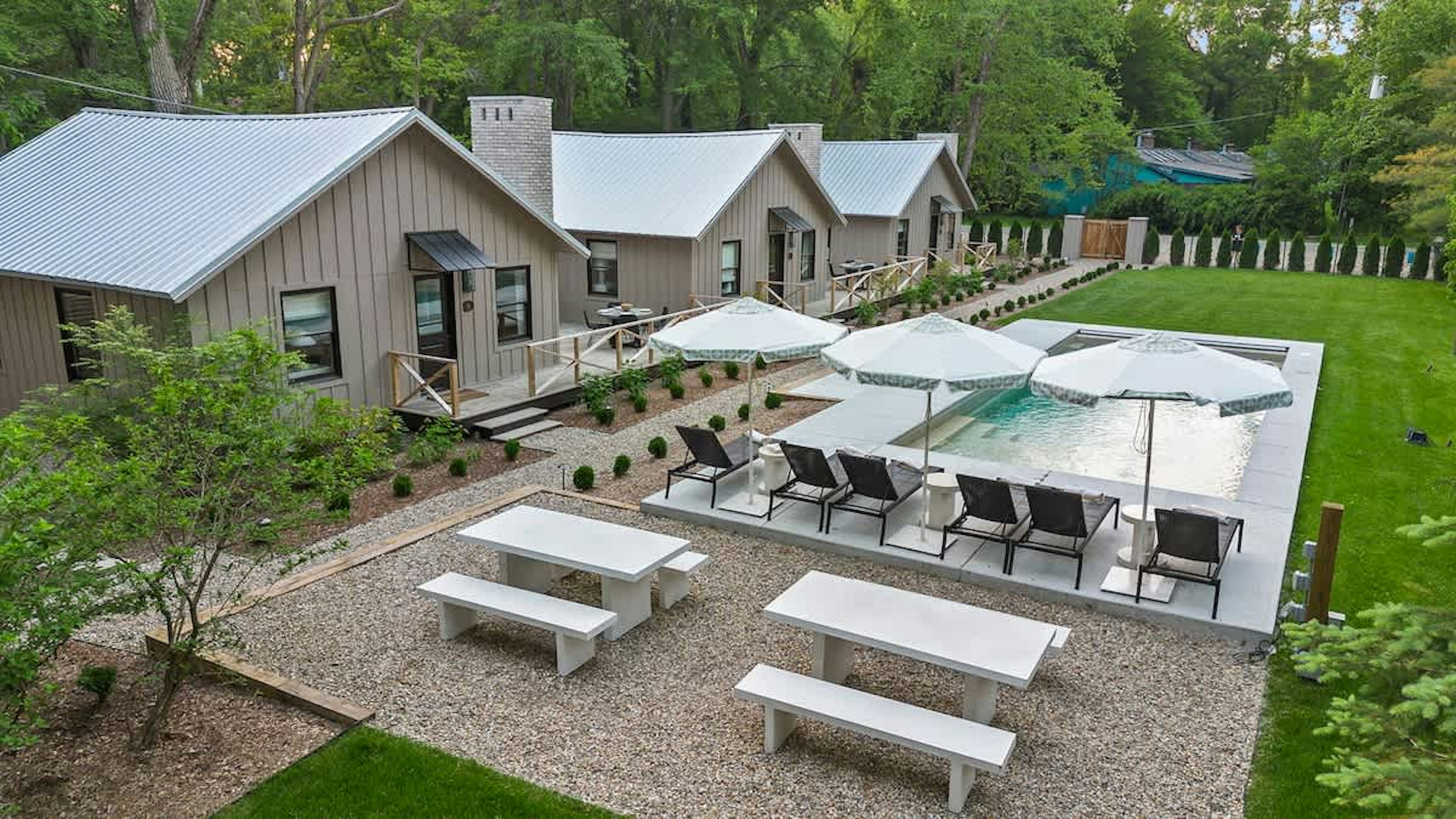 Backyard goals achieved with this pool and picnic area!