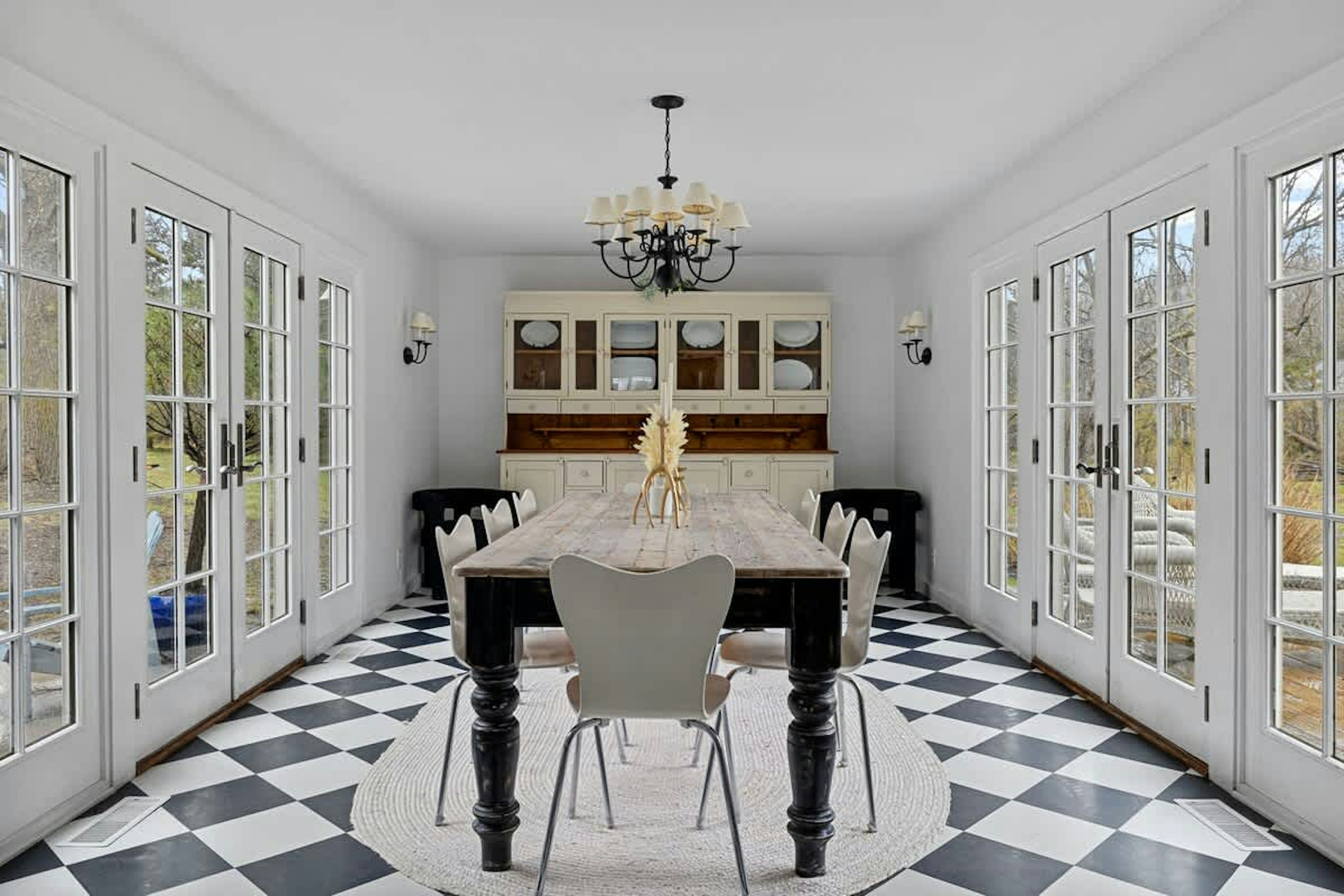 The elegant, beautifully-lit formal dining room comfortably seats eight.