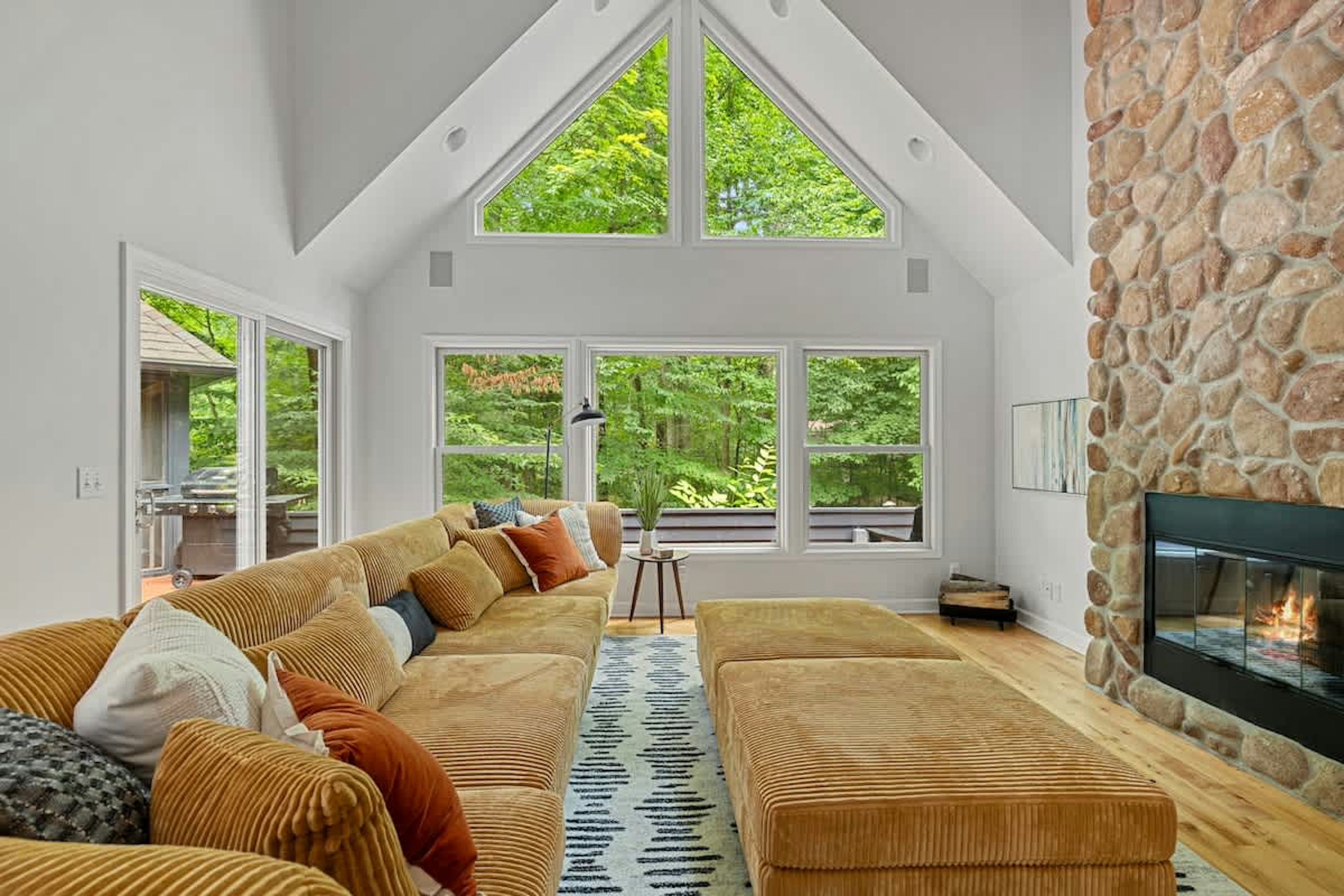Cozy up by the fire and let the forest views take your breath away.