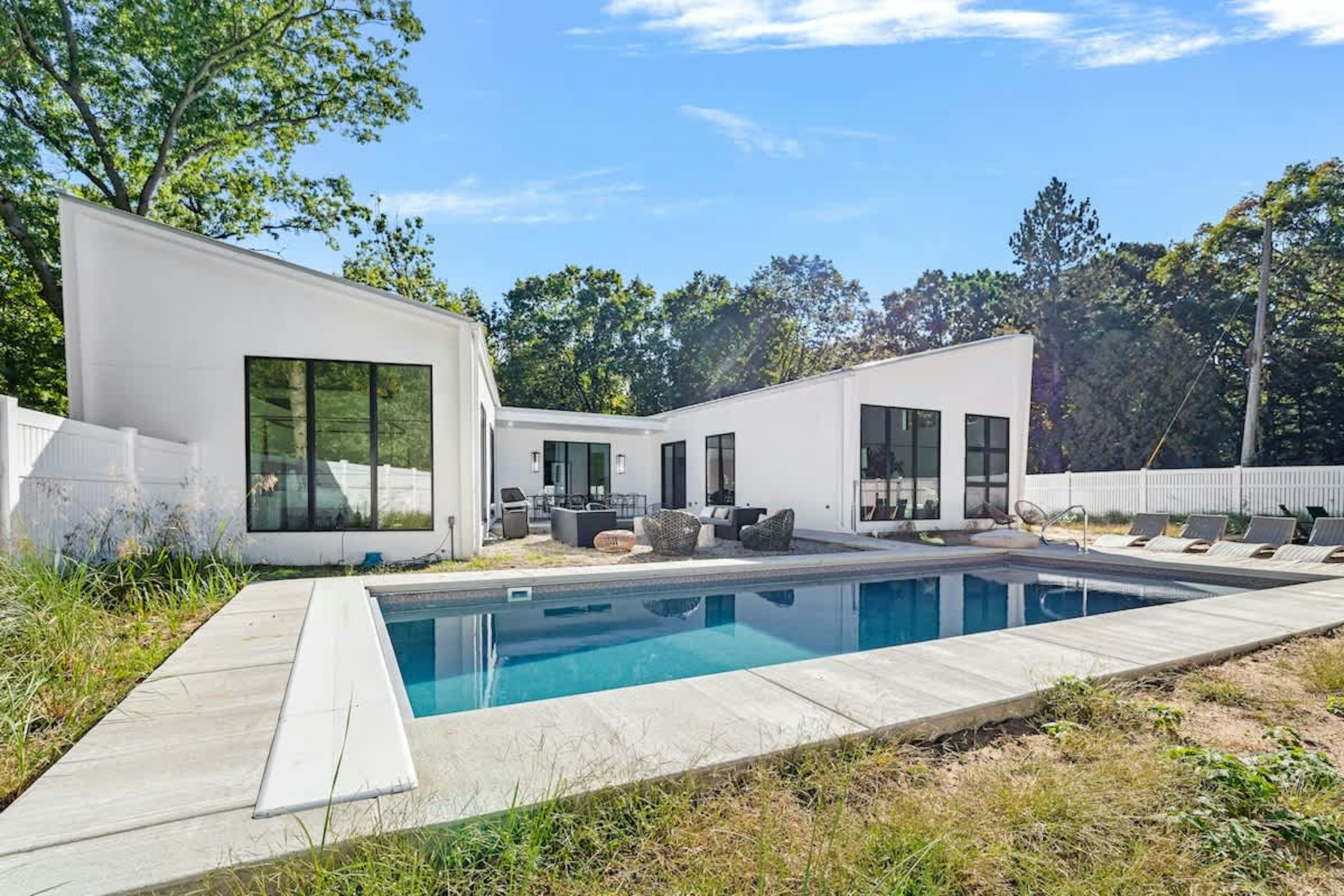 Architectural beauty meets poolside bliss. Ready to dive into relaxation?