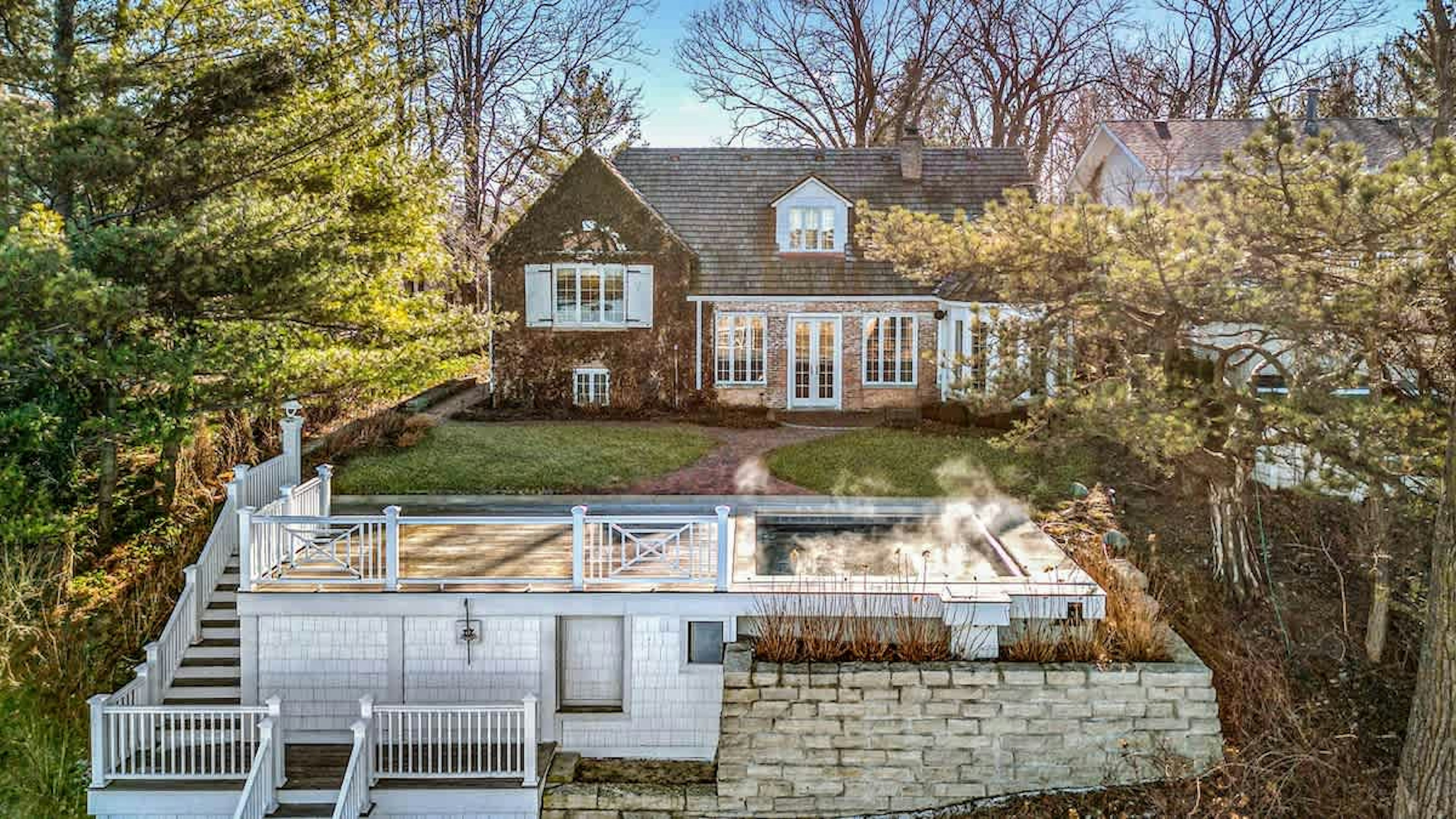 Hot tub mornings, ivy-clad afternoons, and serene sunsets—this is Marquette Cottage.