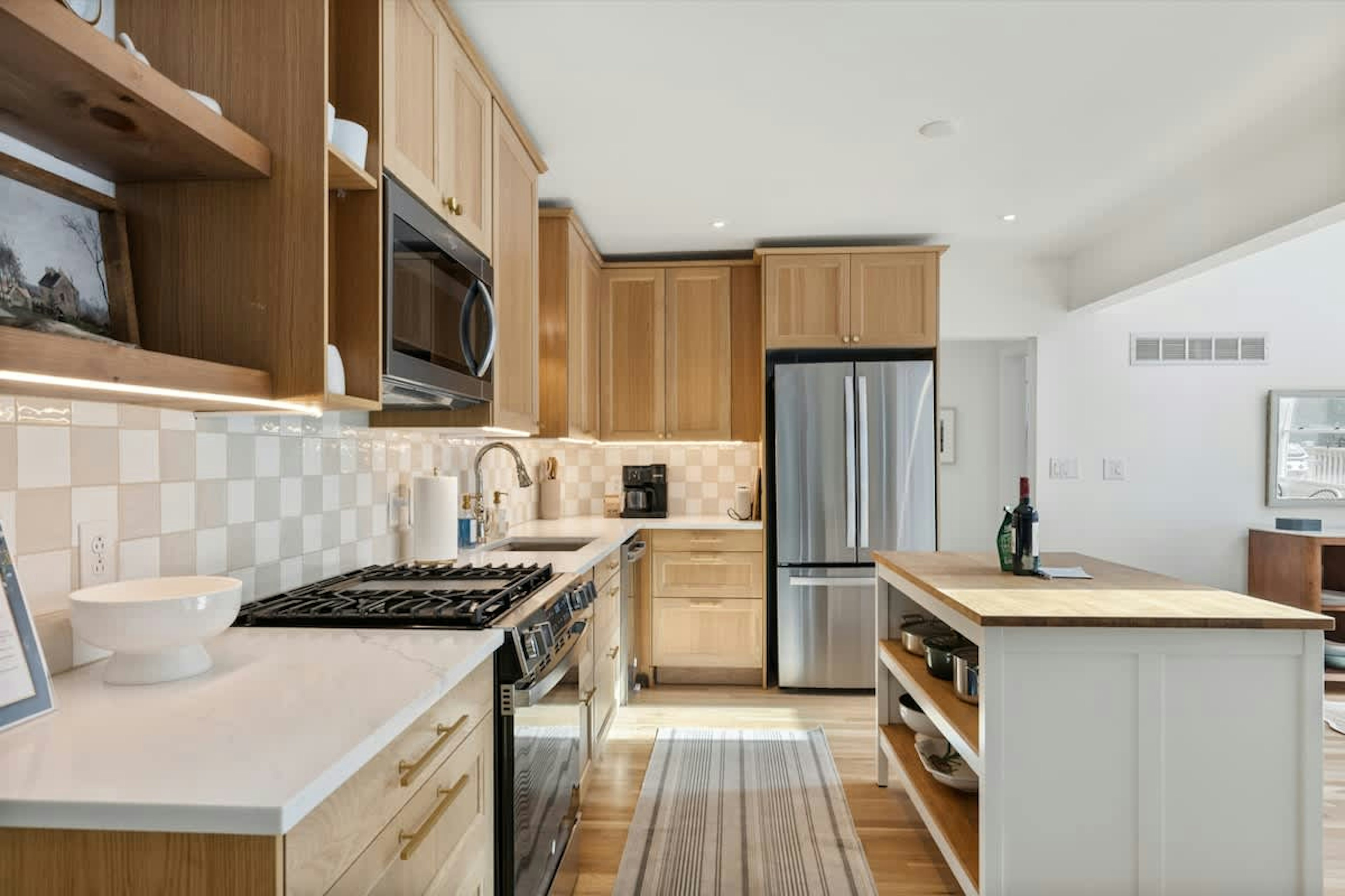 Whip up memories in this dreamy, sunlit kitchen. Fully stocked and ready for family feasts or lazy brunches!