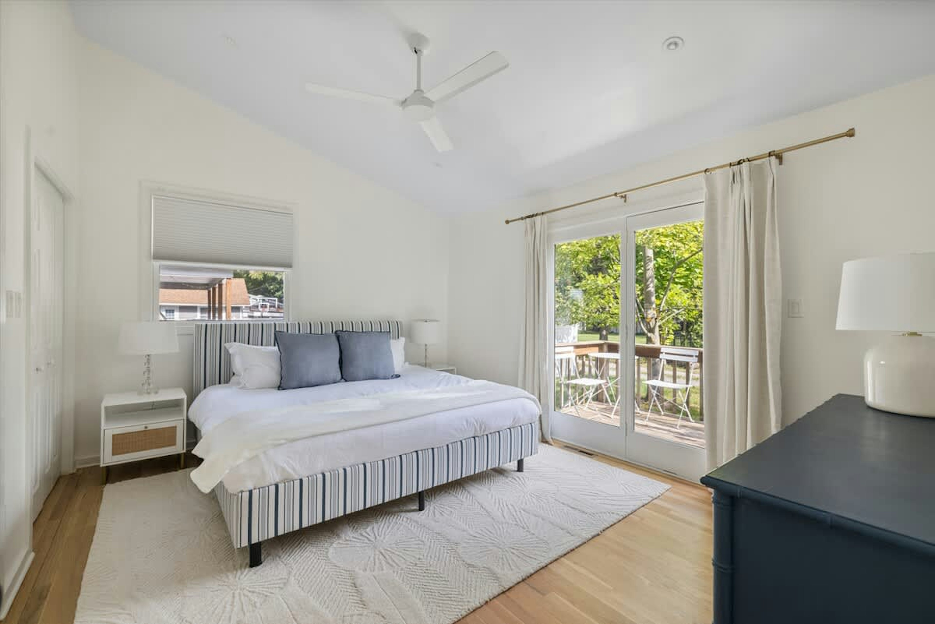 The primary bedroom is on the main level & has a king-size bed.