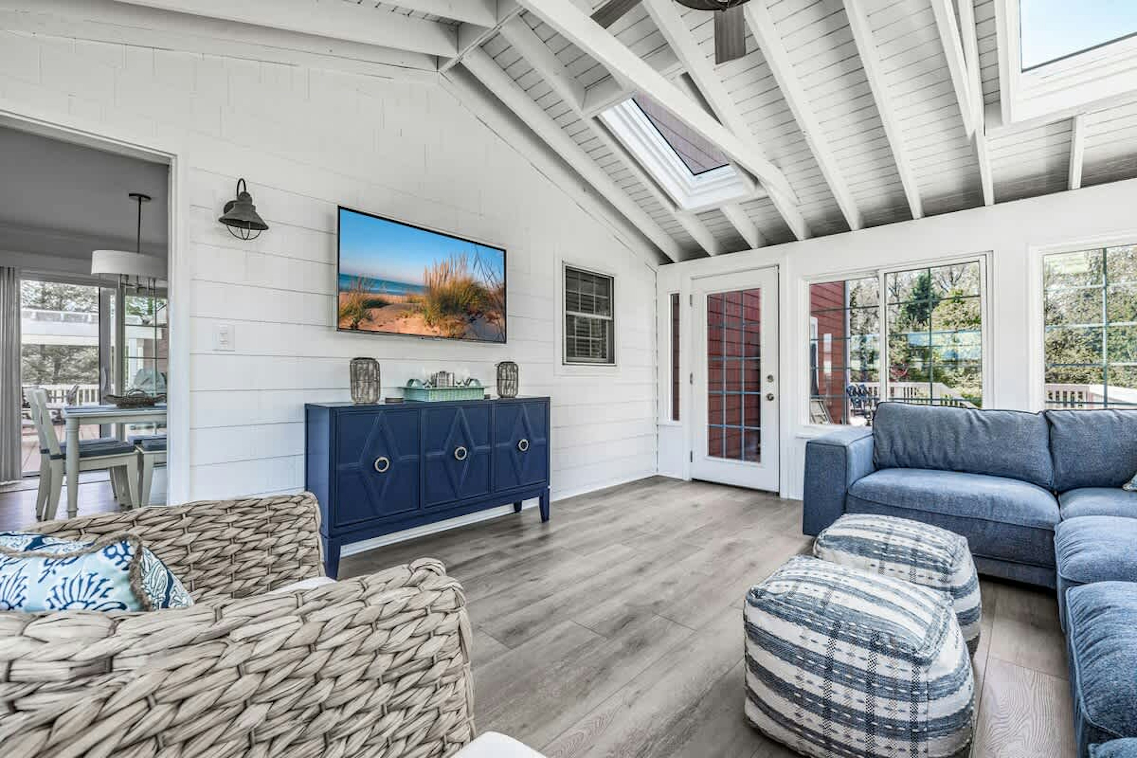 Relax under vaulted ceilings in this breezy indoor retreat.