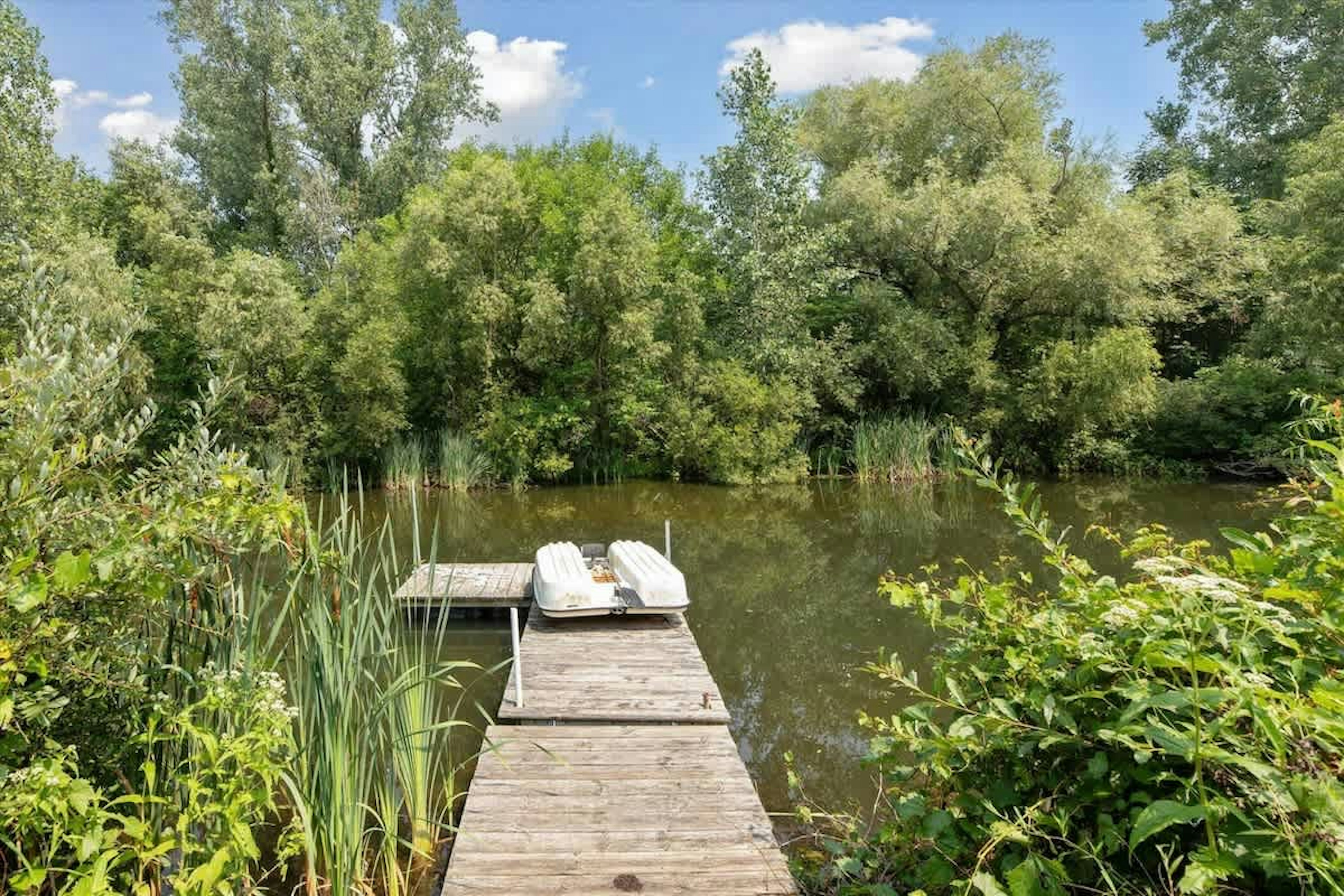 Paddle out or pause, the private pond is yours.