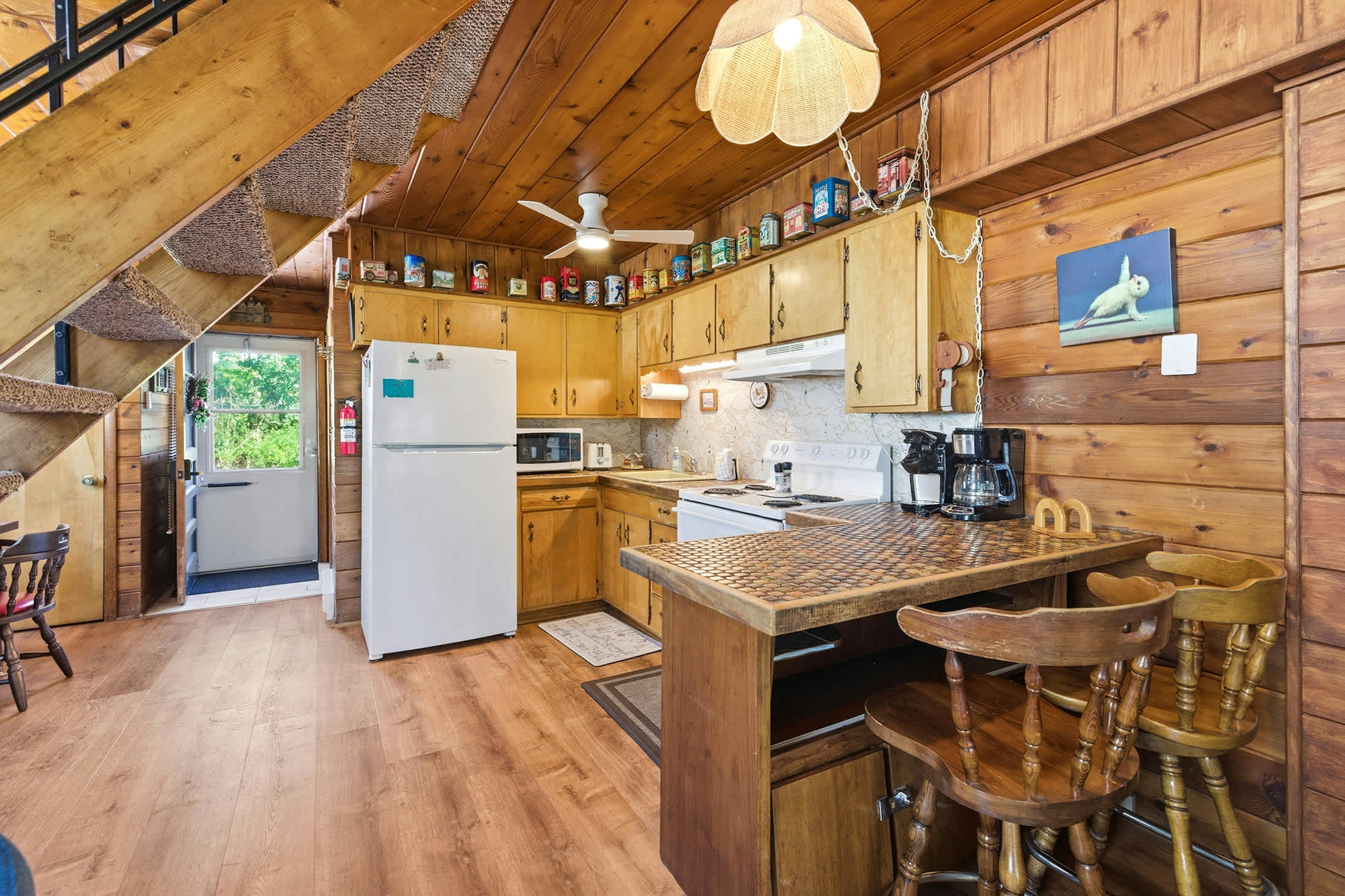 Full kitchen with seating, making meals easy between resort activities.