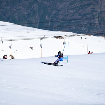 Competitive ski athlete in training | Les 2 Alpes Welcoming ski clubs and ski professionals for training and instruction on the high-altitude ski area of Les 2 Alpes.