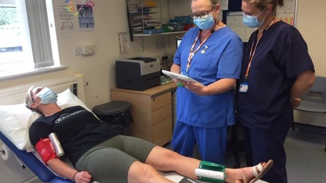 Nurses performing MESI mTABLET ABI measurement