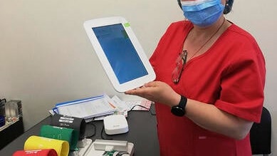 Nurse using MESI mTABLET