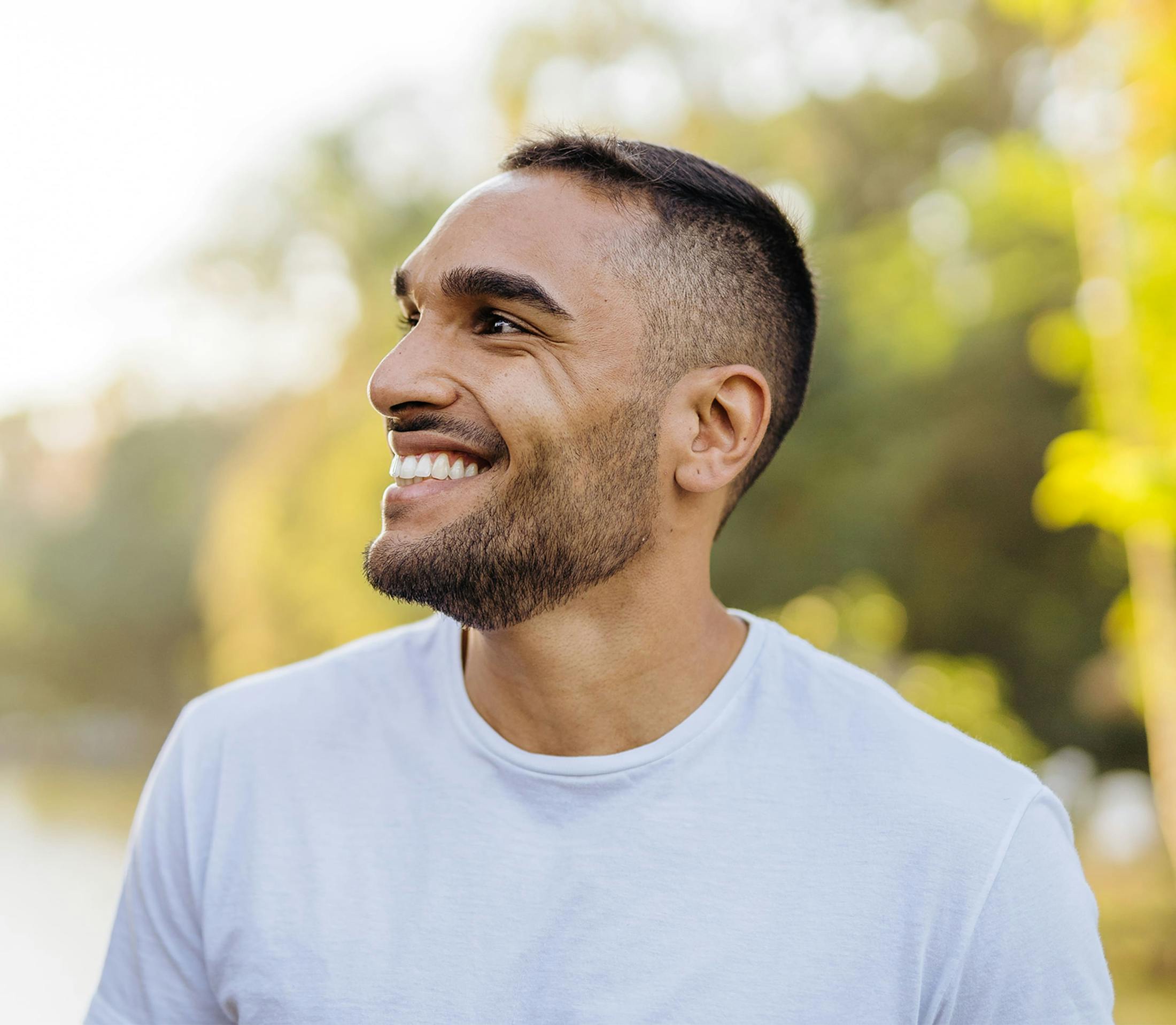 Man smiling outdoors