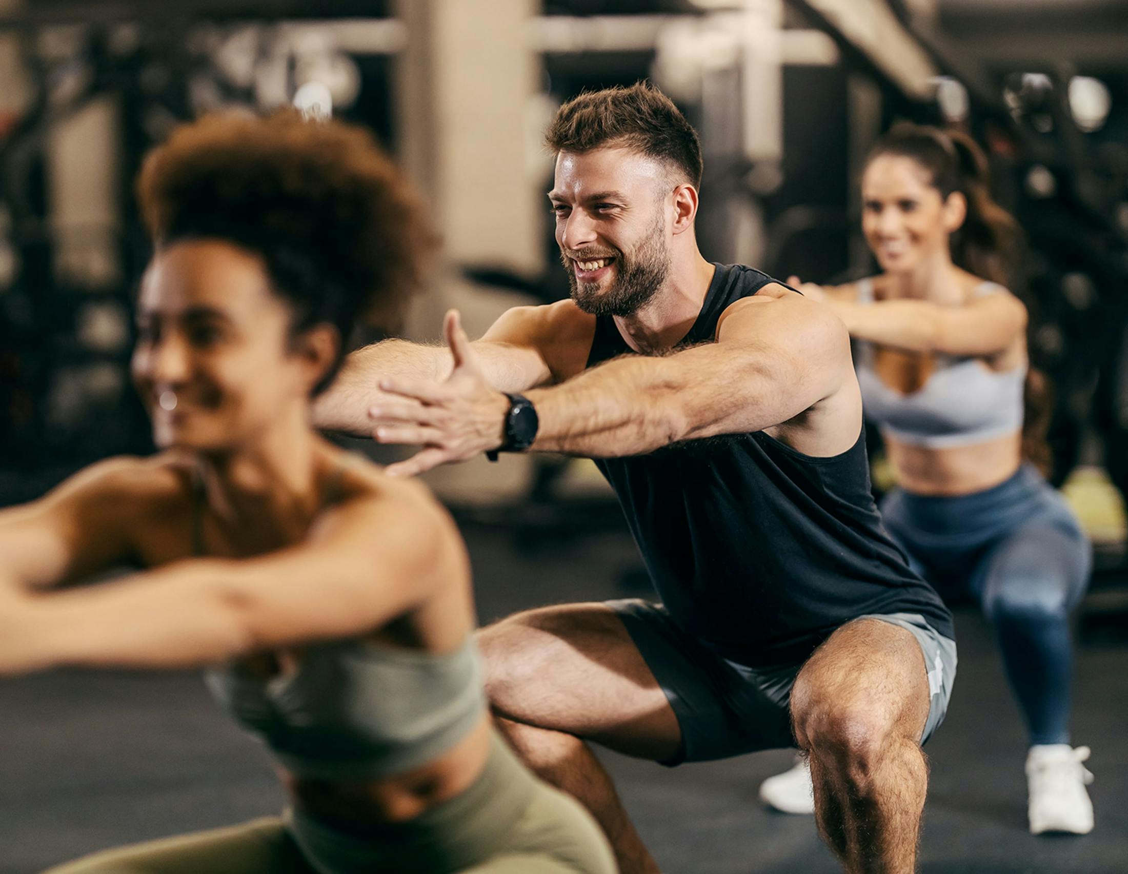 Three people during a gym class