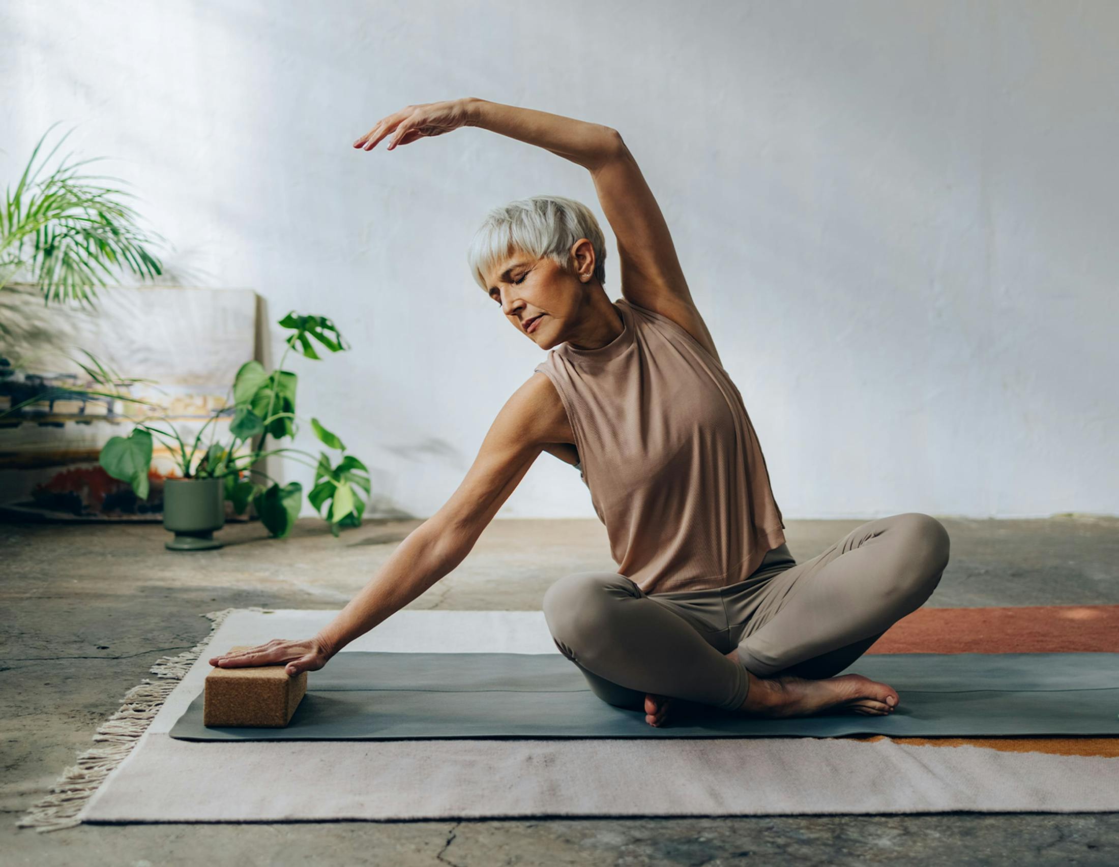 Woman stretching on the floor