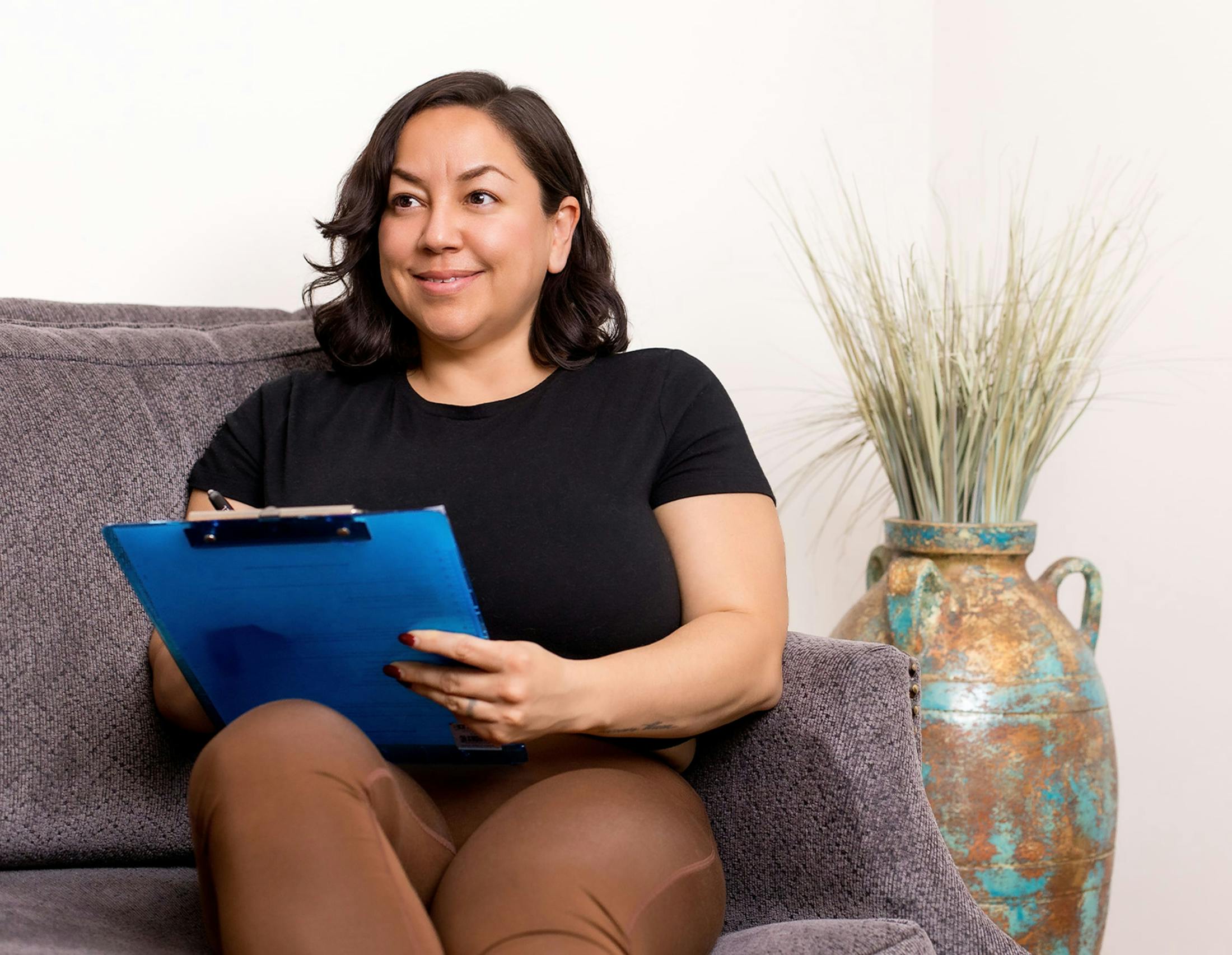 Woman sitting and filling out paperwork