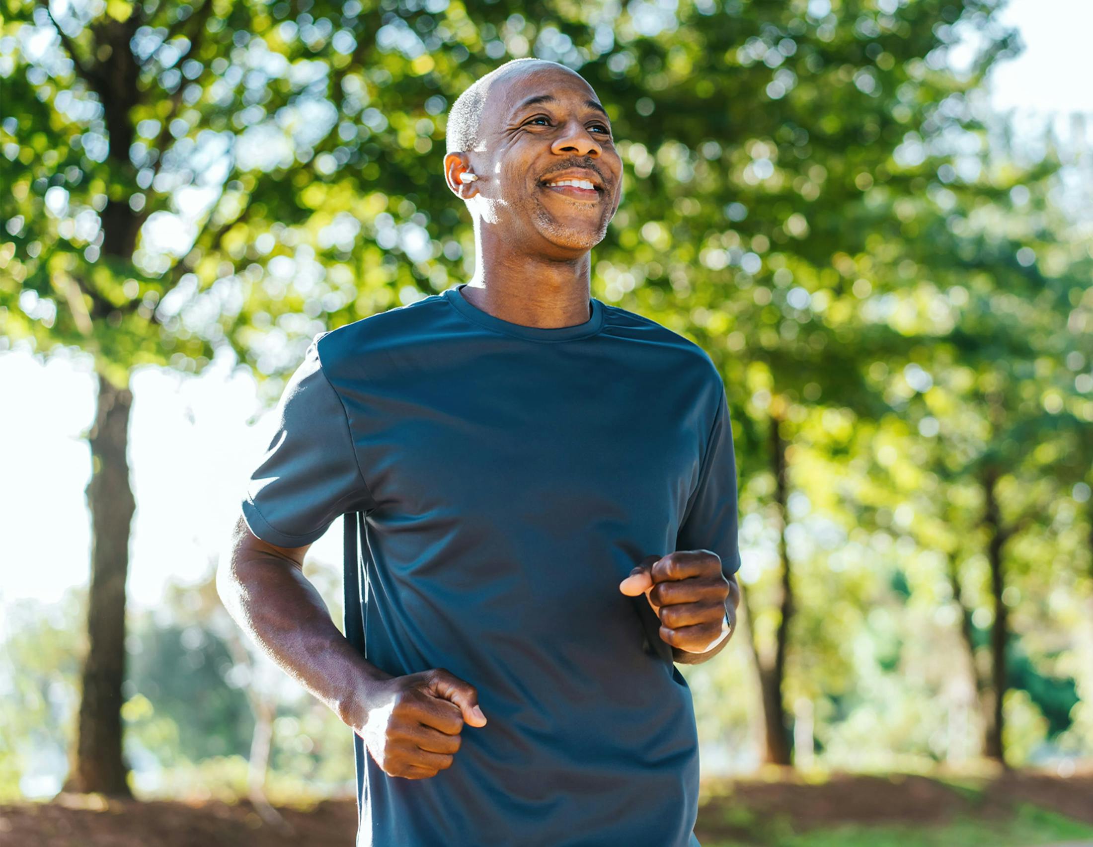 Man running and smiling