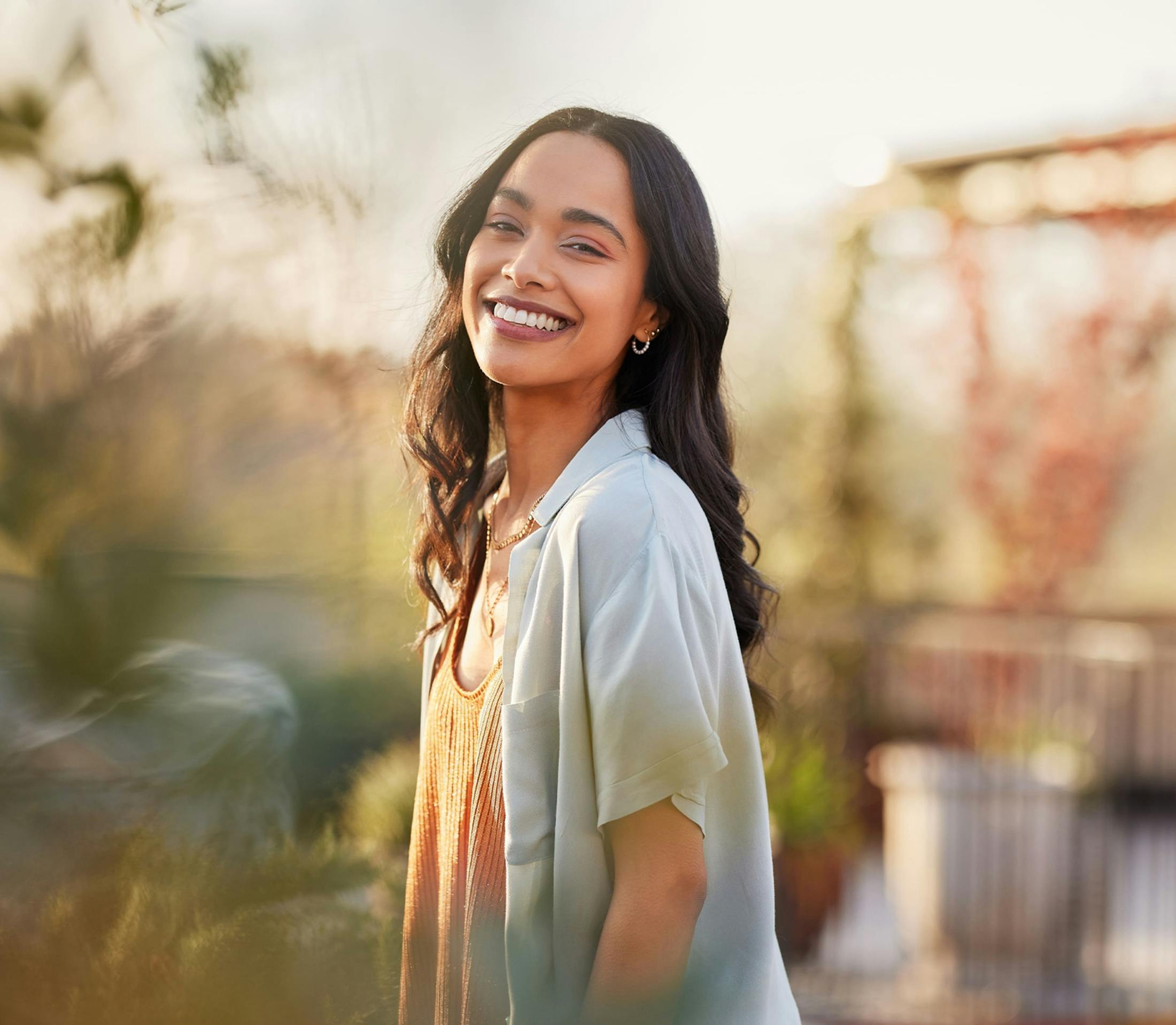 brunette woman smiling at camera