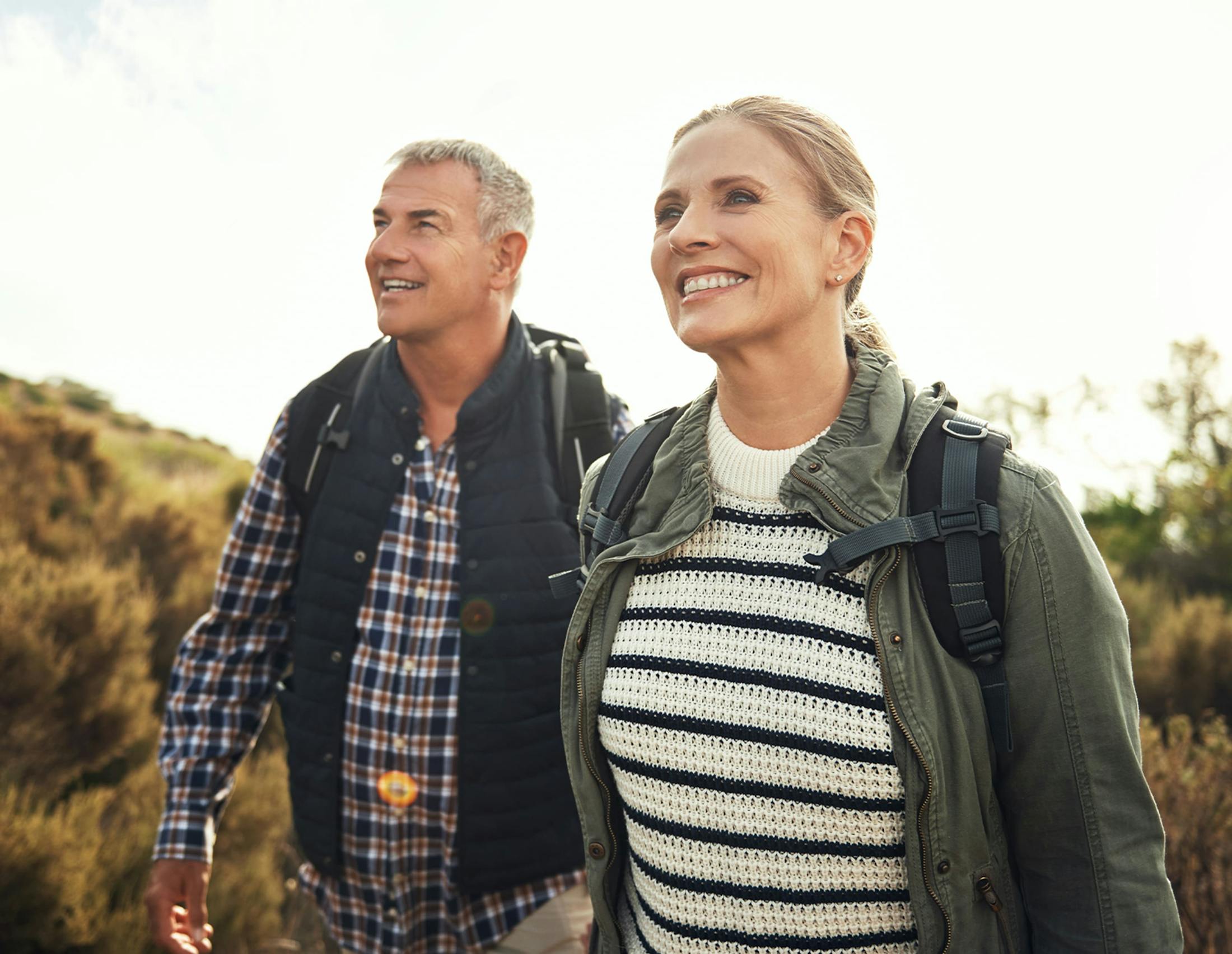 Man and woman during hike smiling