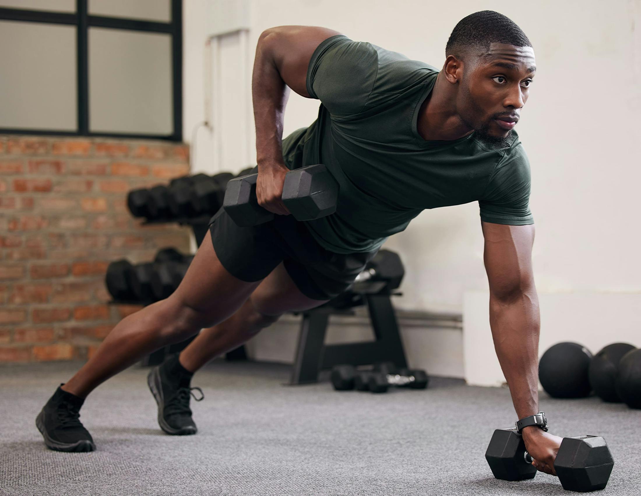 Man working out with dumbells