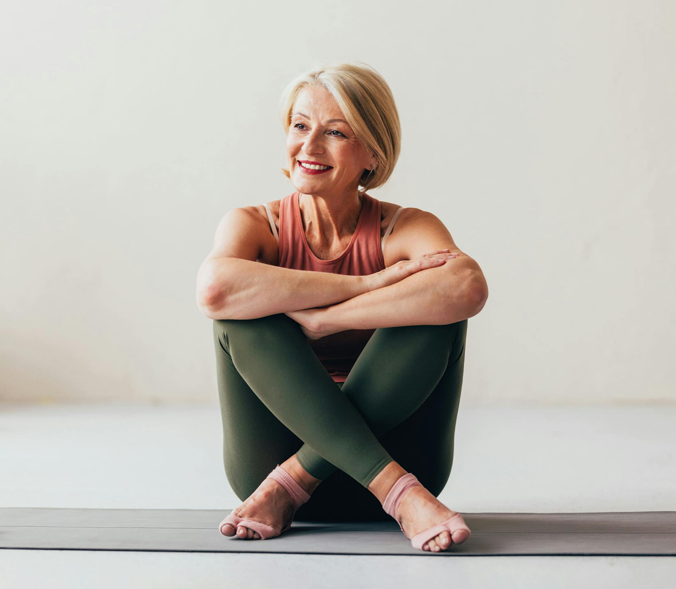 Woman sitting and smiling