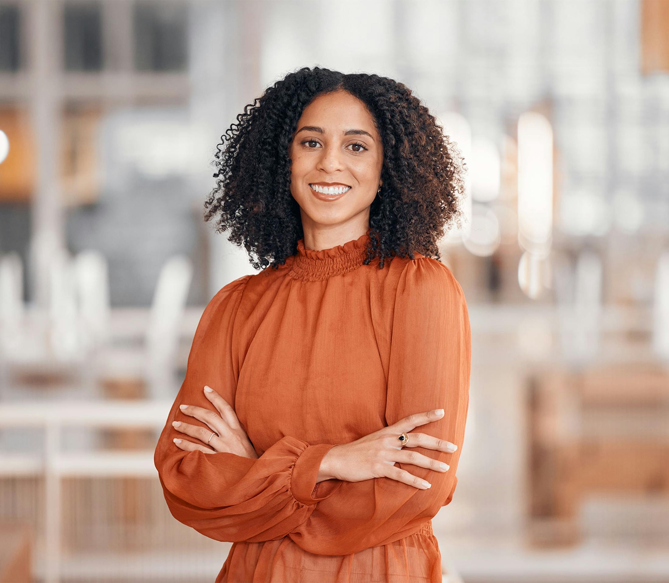Woman crossing arms smiling