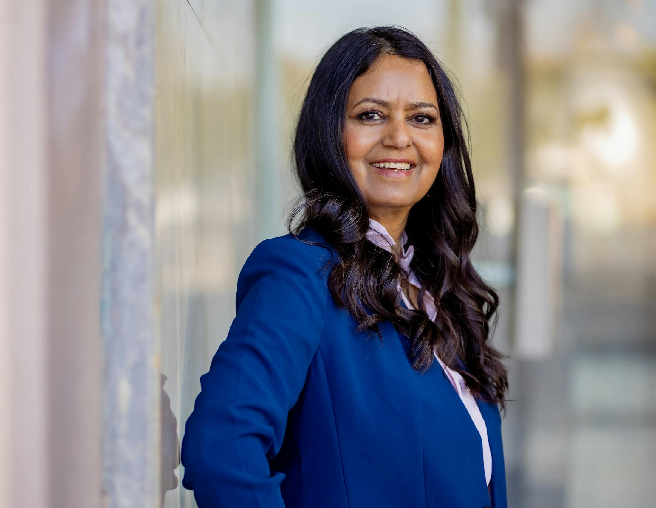 Female Dr. in blue suit