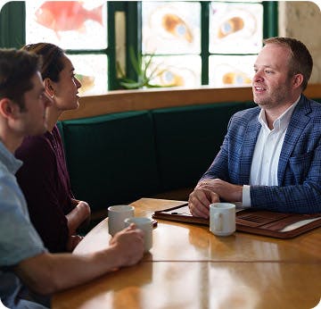 Lawyer talking to clients